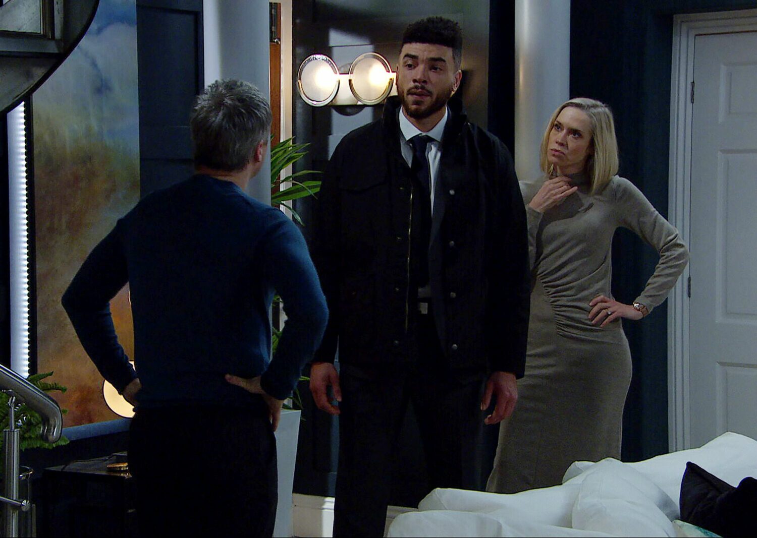 Ruby watches on curiously as Nate confronts Caleb in Emmerdale