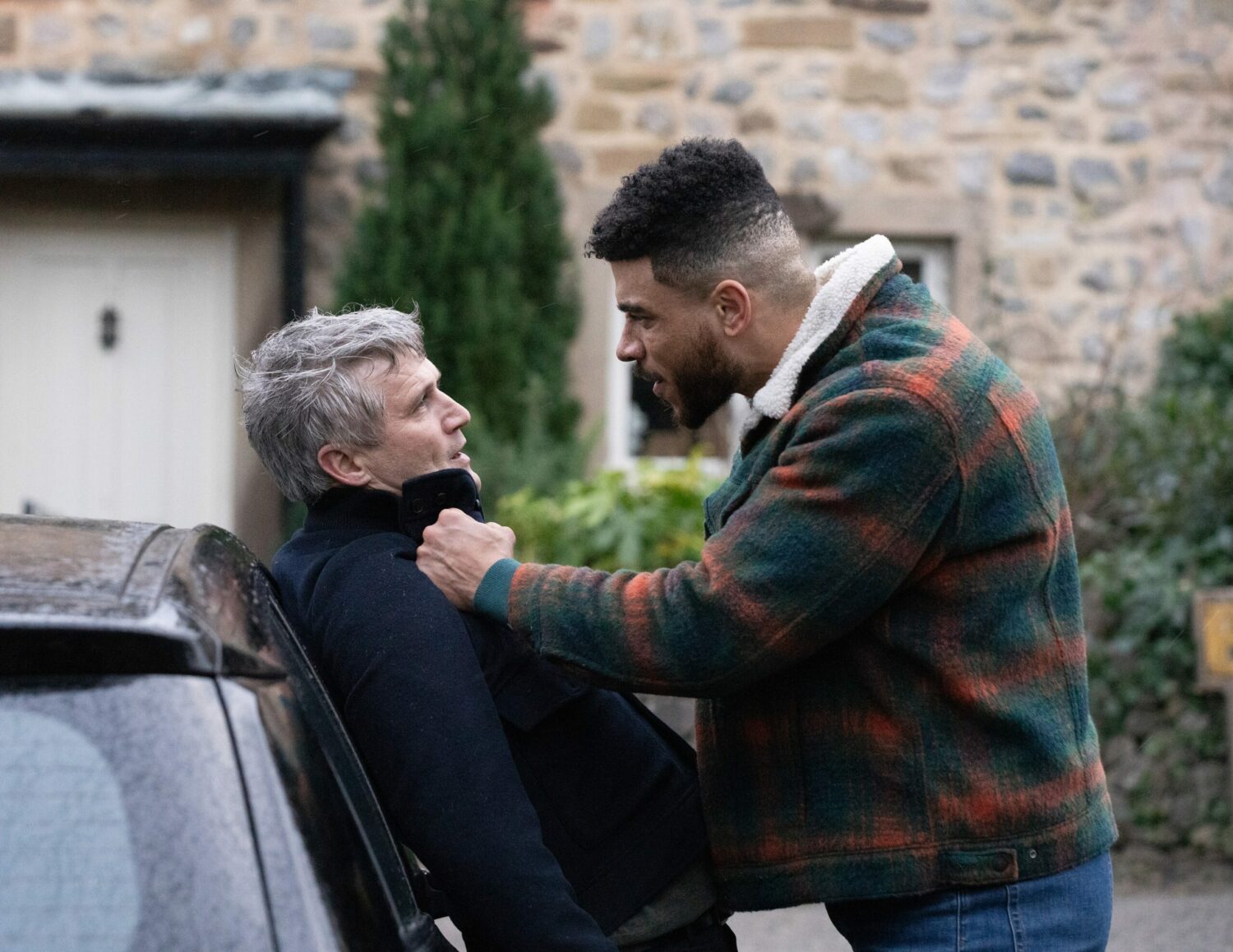 Nate pins Caleb up against a car in fury