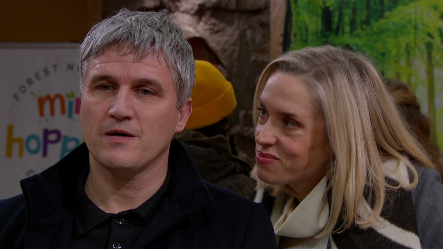 Caleb Milligan looks annoyed as Ruby pours poison in his ear