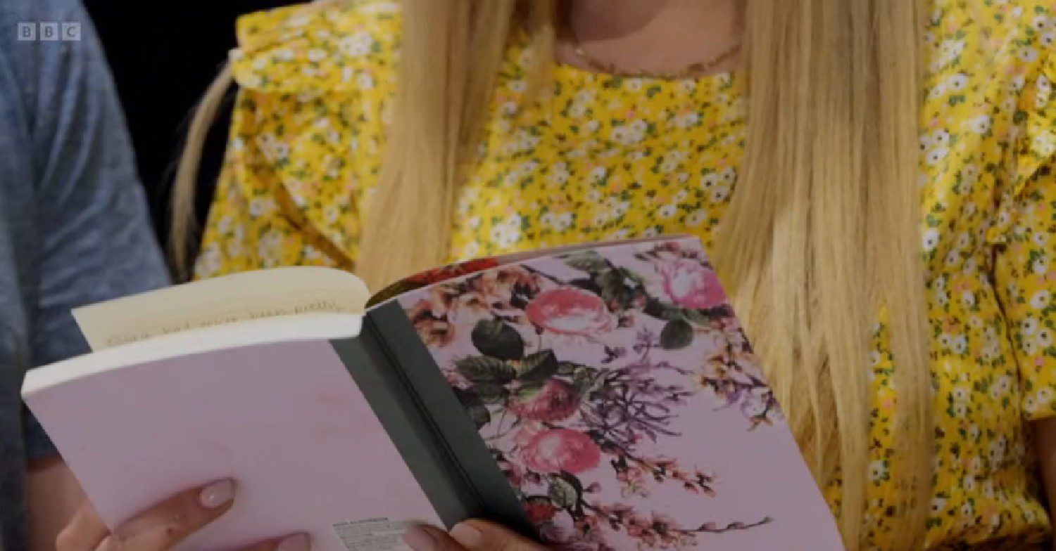 Stacey Solomon reading book on Sort Your Life Out