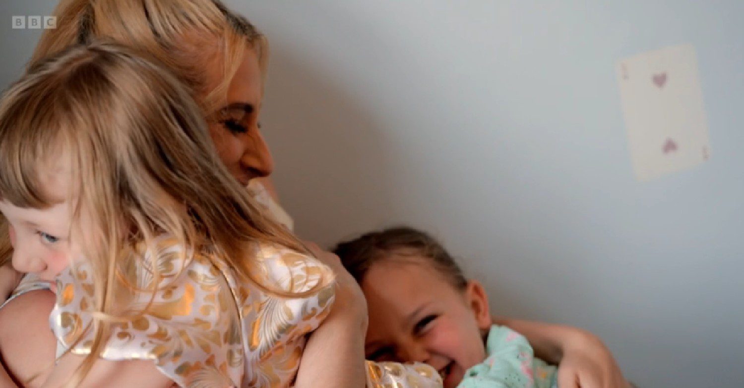 Stacey Solomon hugs two little girls on Sort Your Life Out