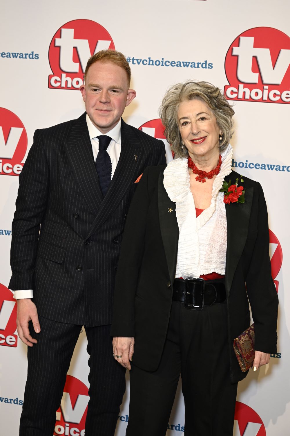 Coronation Street stars Colson Smith and Maureen Lipman smile on the red carpet at the TV Choice awards