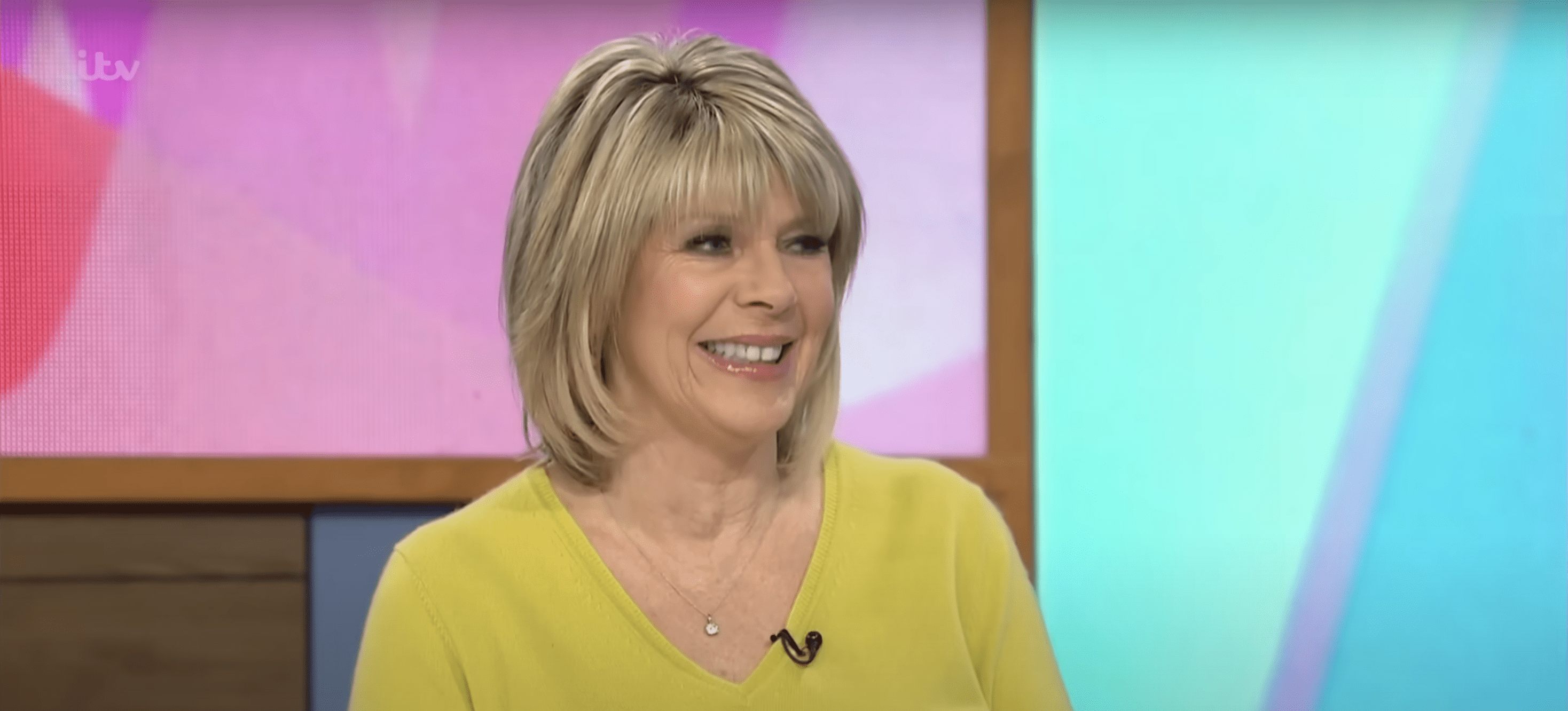 Ruth Langsford smiling wearing a green jumper on Loose Women