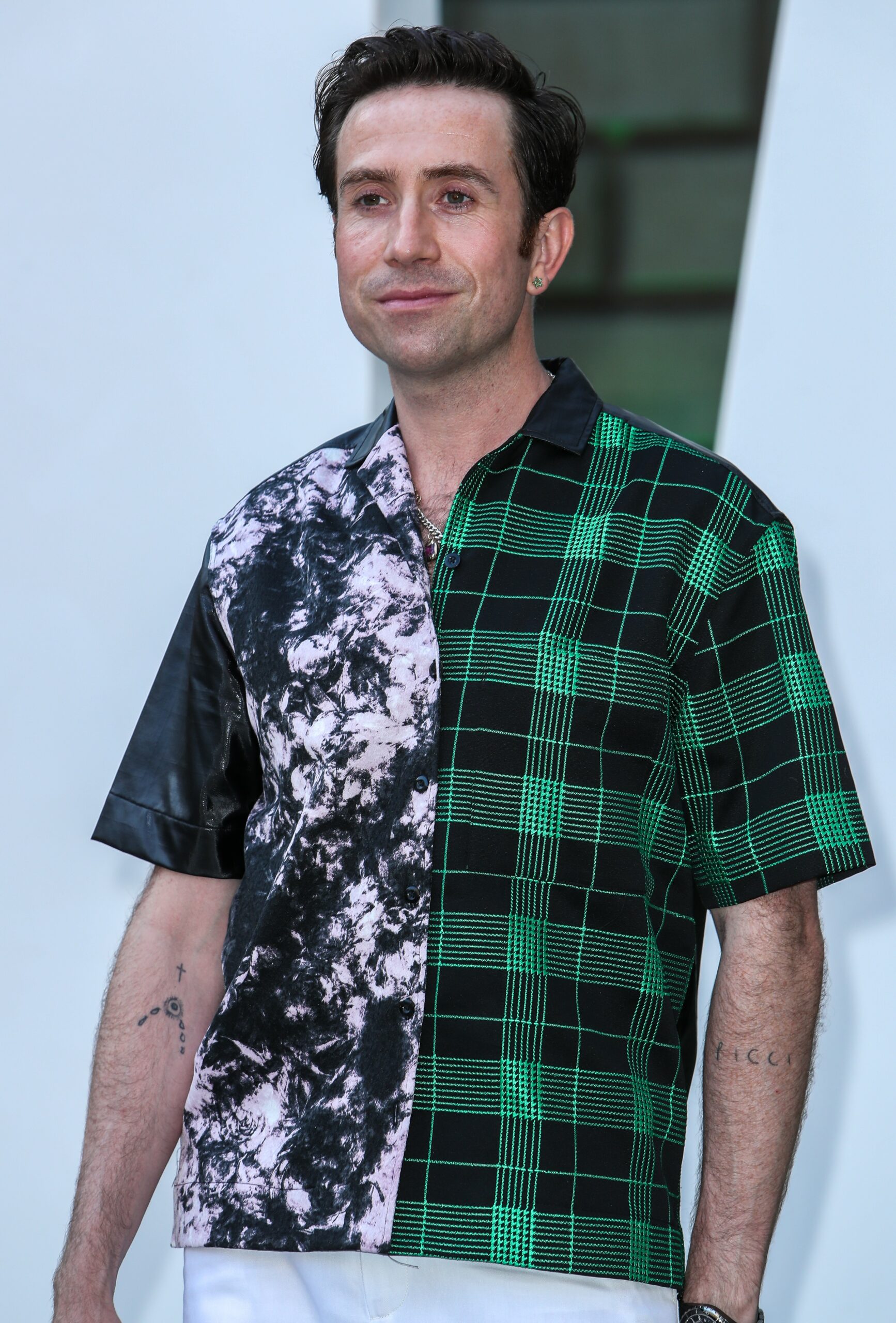 Nick Grimshaw posing at event