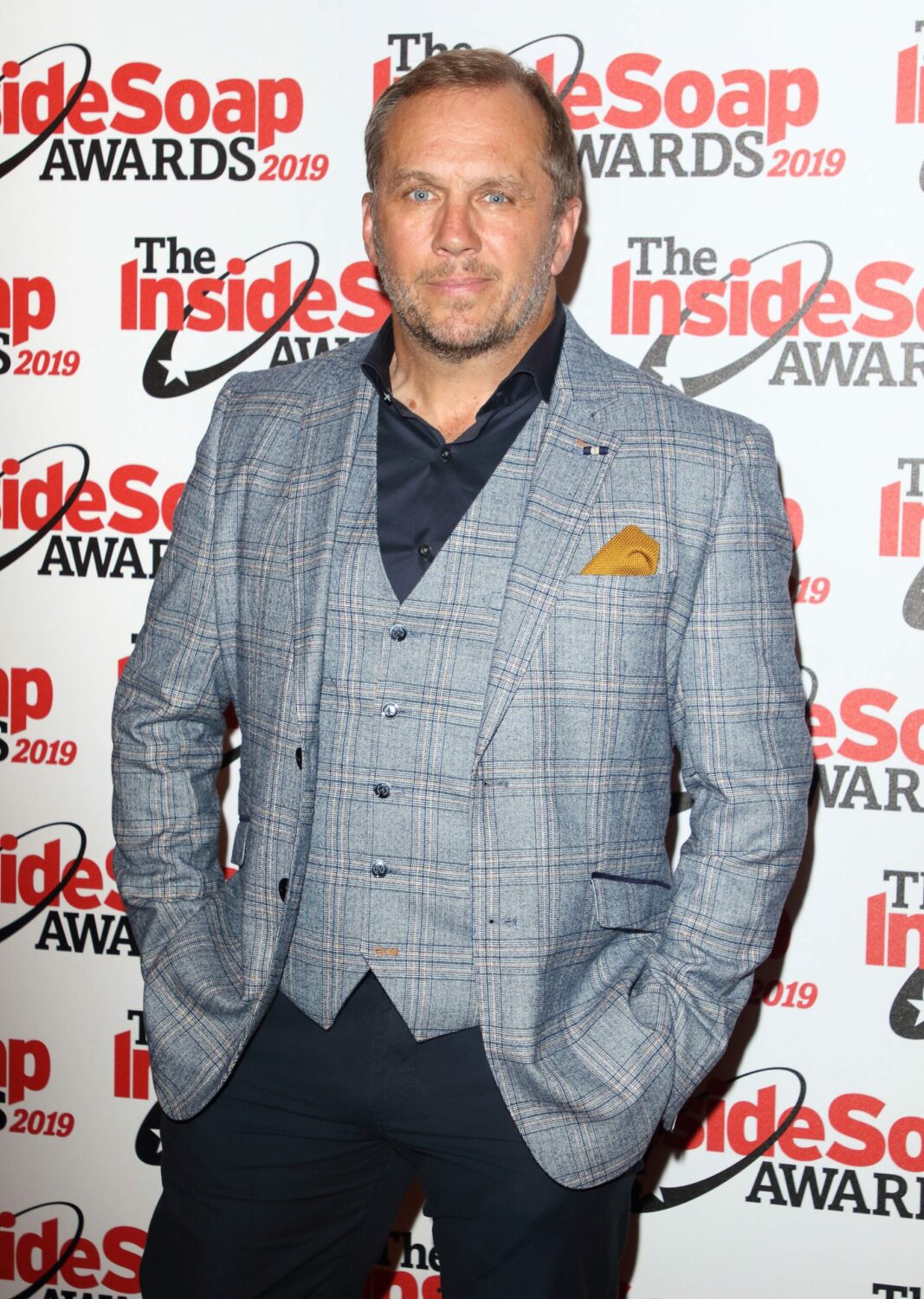 Emmerdale star Dean Andrews on the red carpet at the Inside Soap Awards