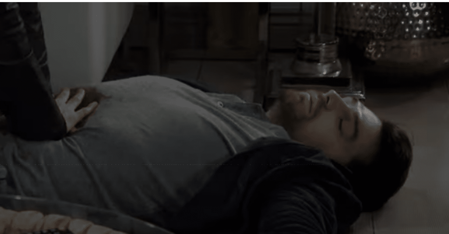 Mack lying unconscious on the floor in Emmerdale (Credit: ITV/YouTube)