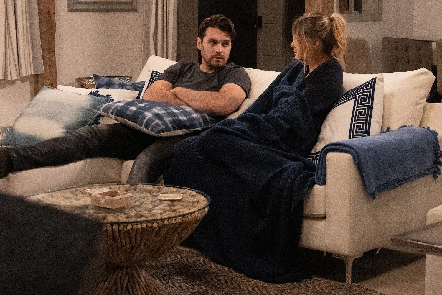 Emmerdale's Mack is talking to Charity on the sofa