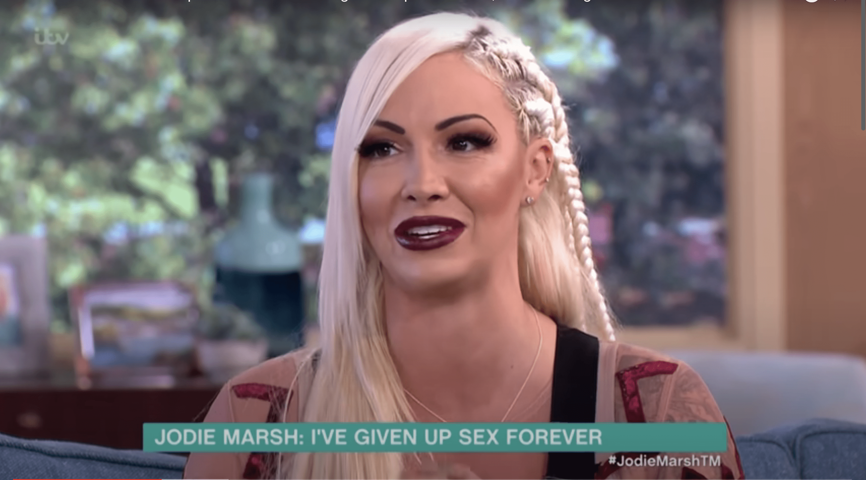 Jodie Marsh with blonde hair and dark lipstick on This Morning