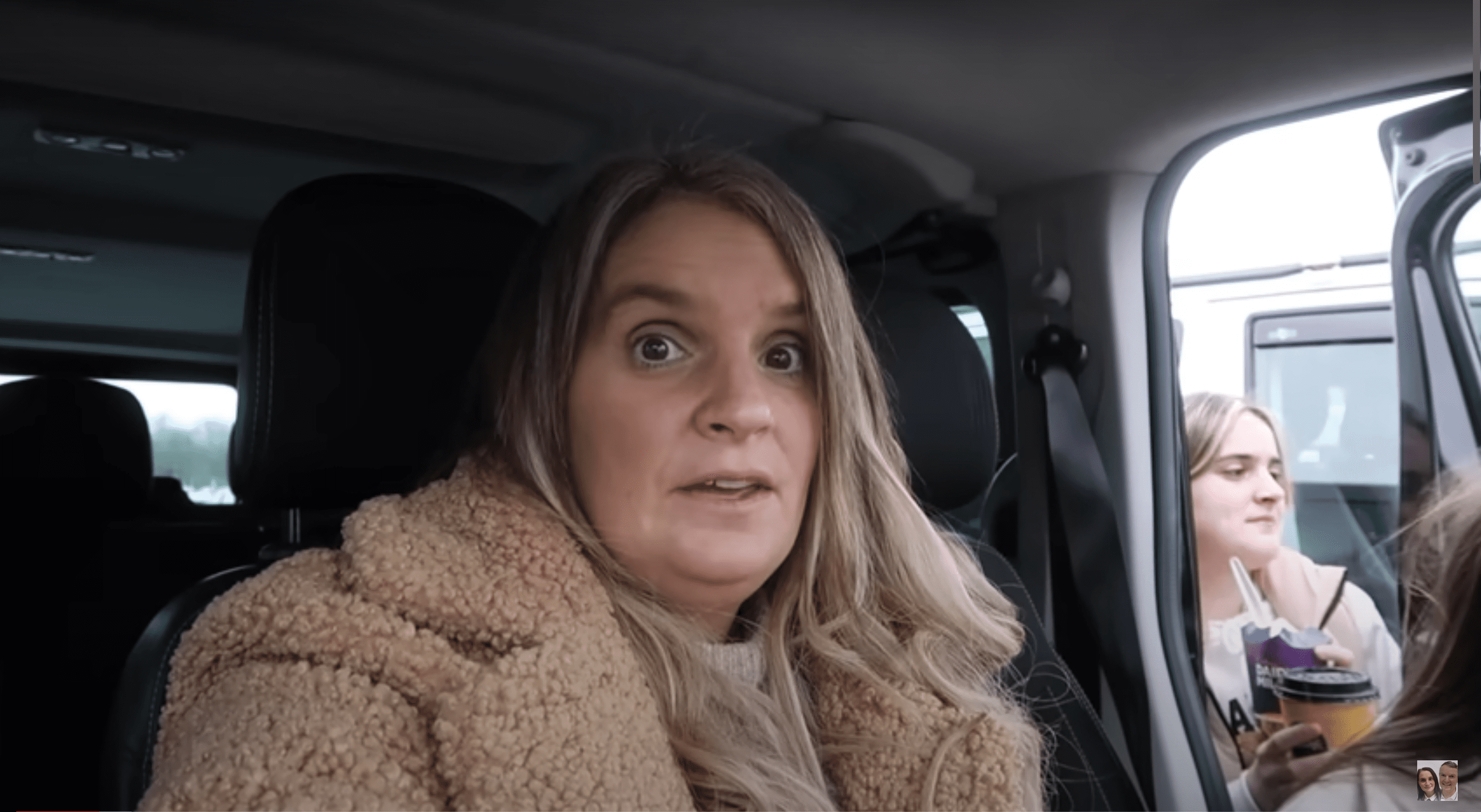 22 Kids and Counting star Sue Radford wearing a fluffy coat vlogging 