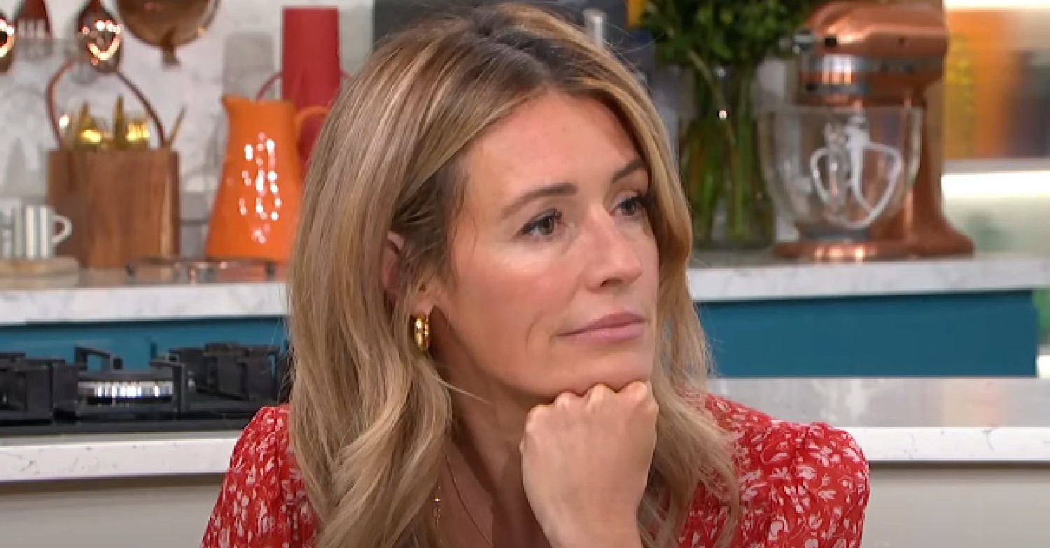 Cat Deeley rests her head on her hand on This Morning