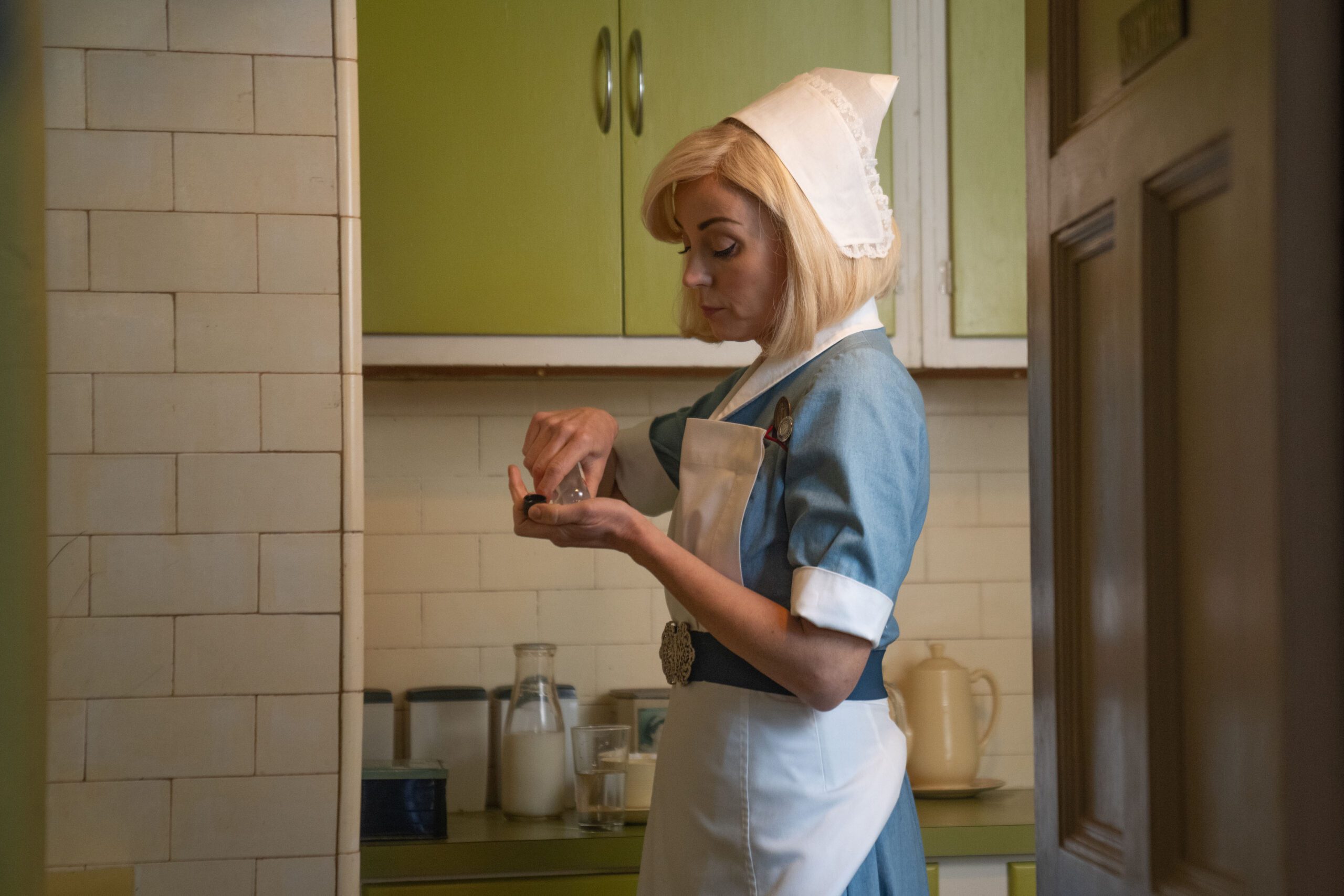 Trixie taking pills on Call the Midwife