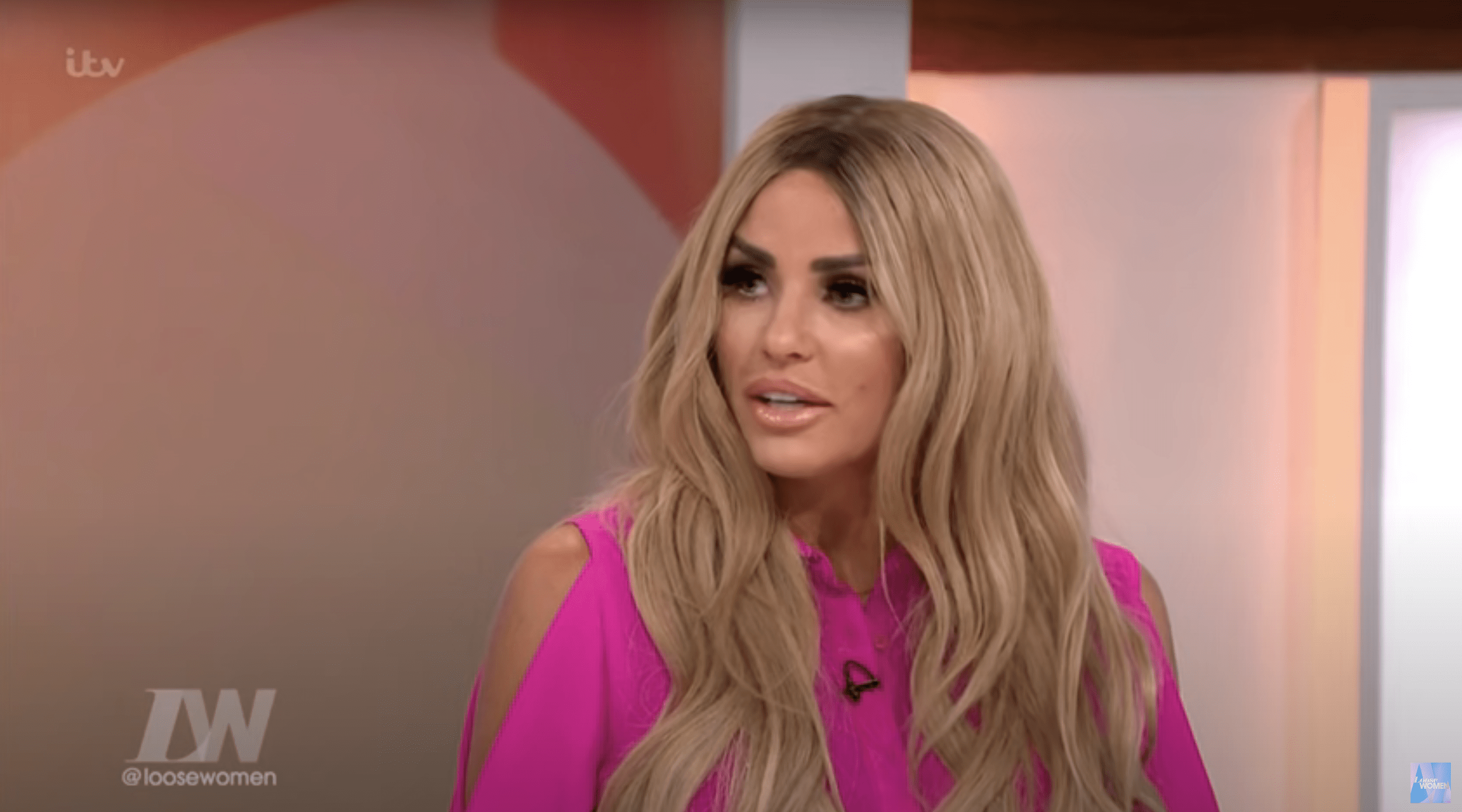 Katie Price with long blonde hair and pink shirt on Loose Women