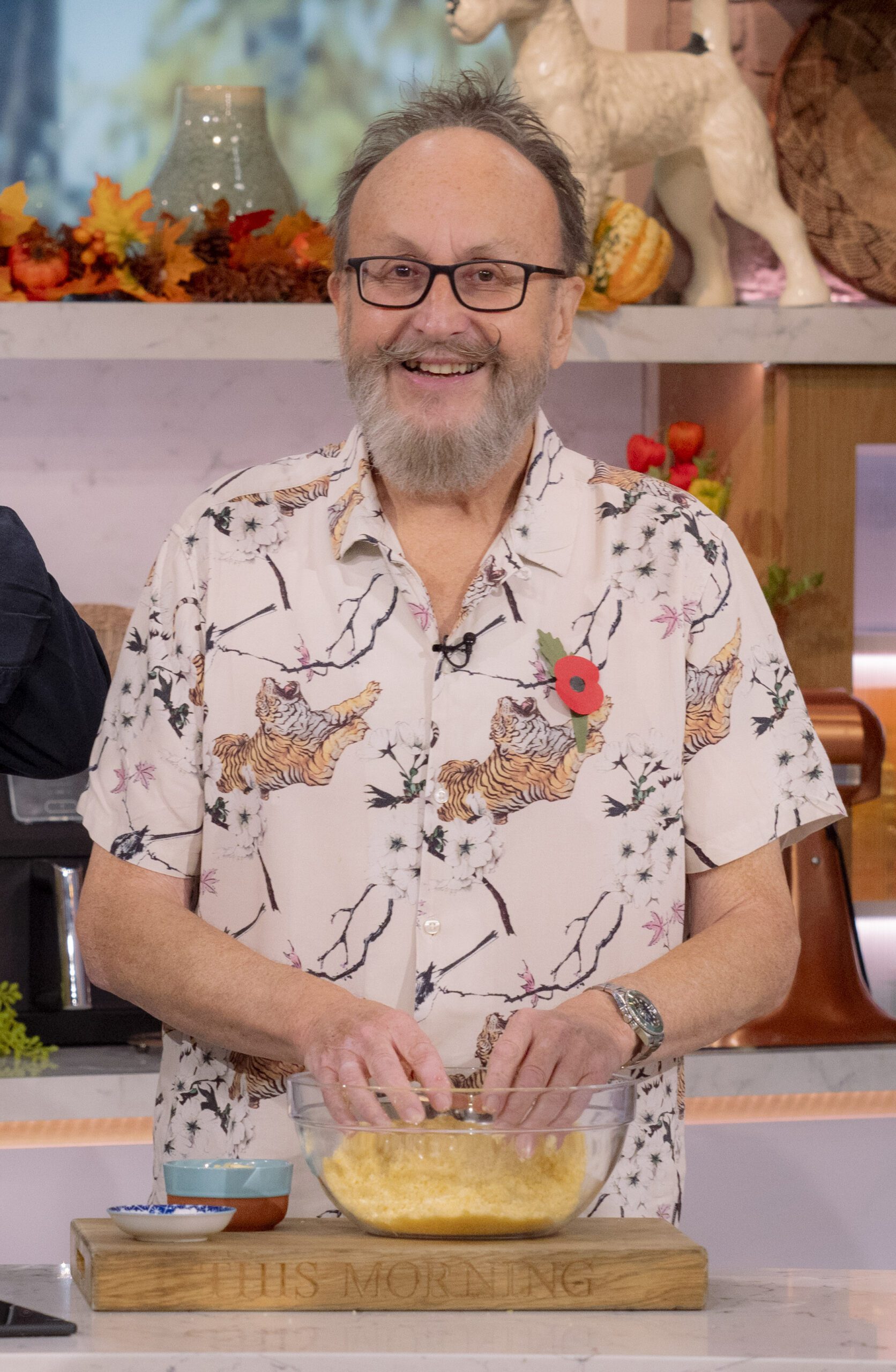 Dave Myers smiles as she cooks on This Morning