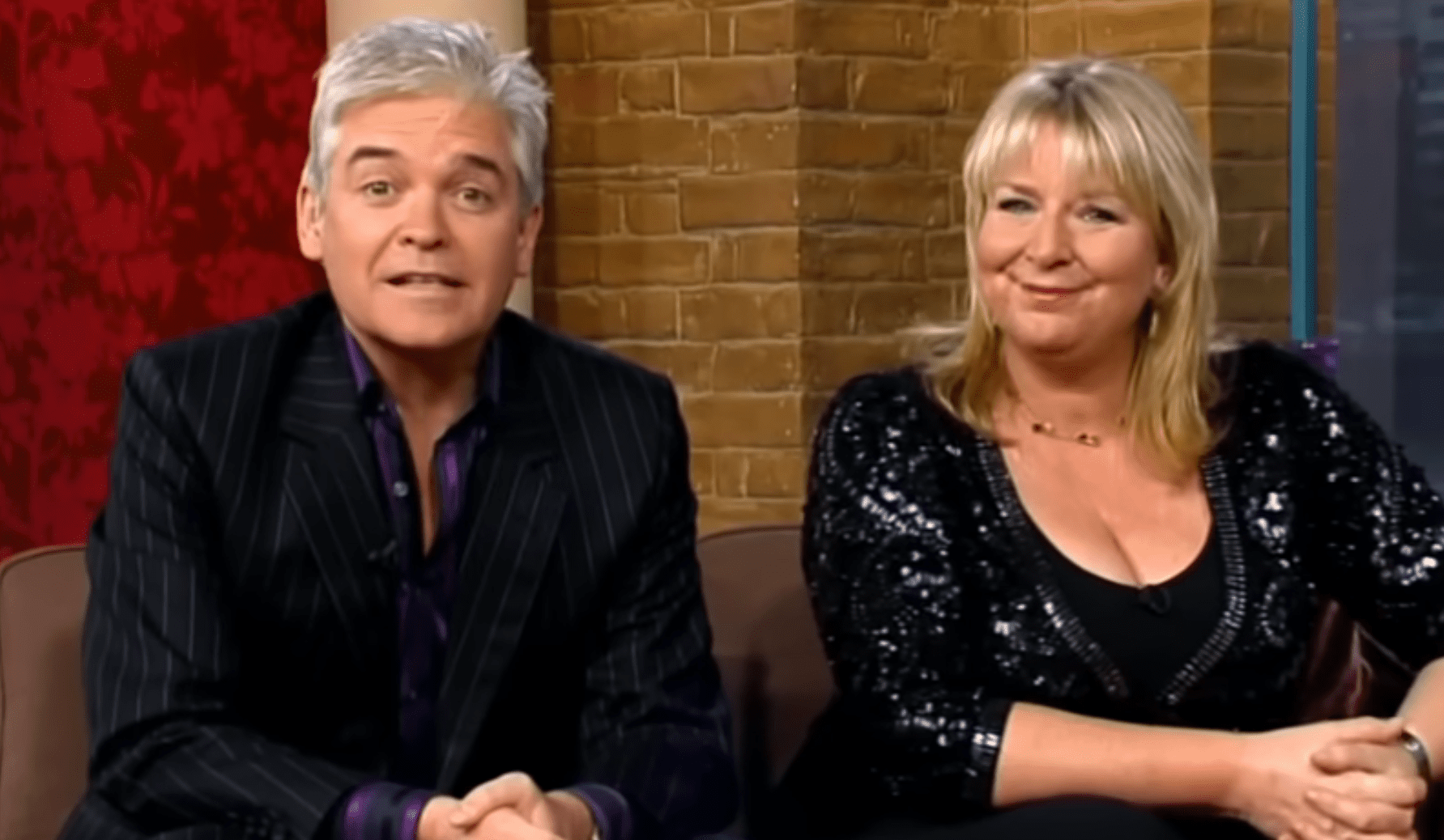 Phillip Schofield and Fern Britton smile as they host This Morning