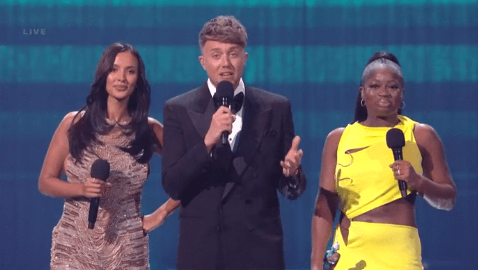 Maya Jama, Roman Kemp and Clara Amfo present the Brits