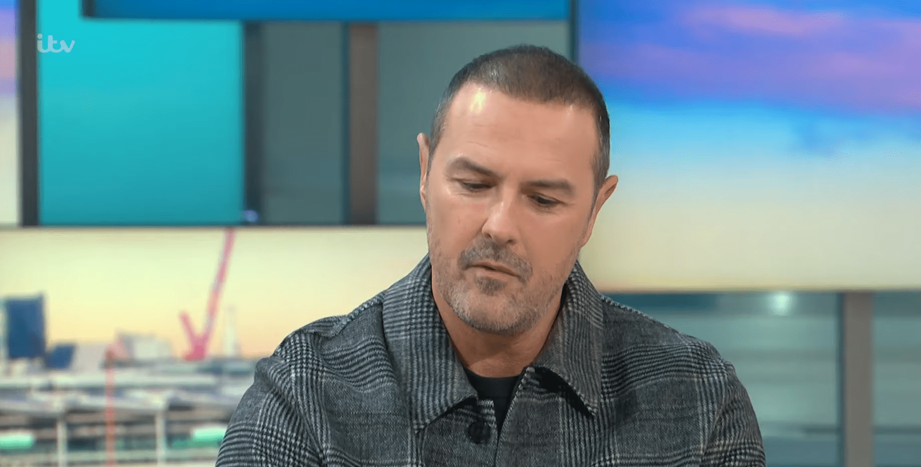 Paddy McGuinness looks down as he talks