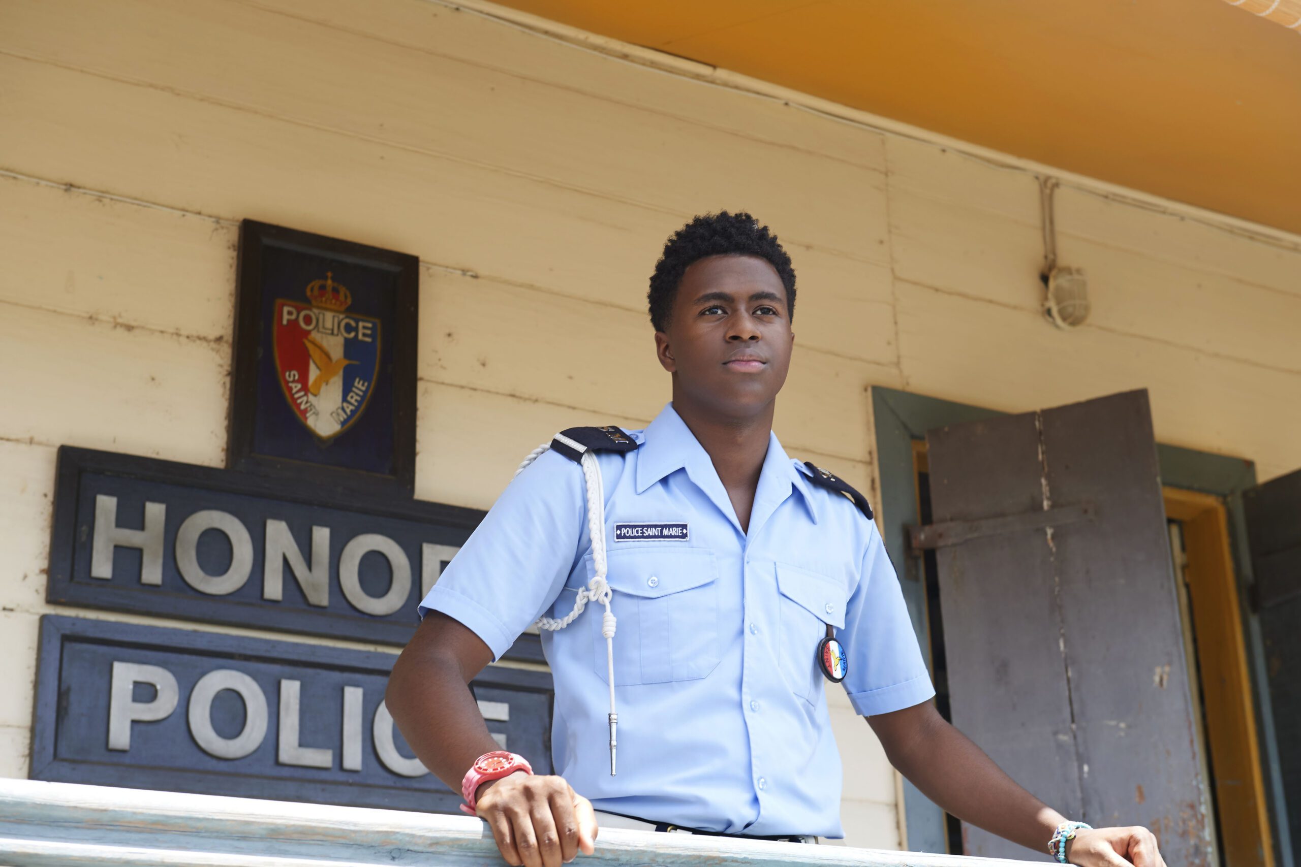 Marlon looks out to sea on Death in Paradise