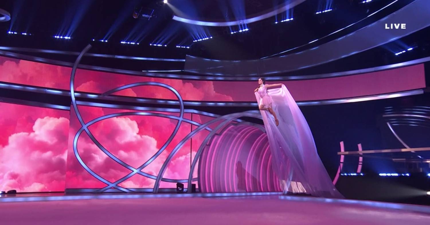 Amber Davies flies through the air on Dancing On Ice