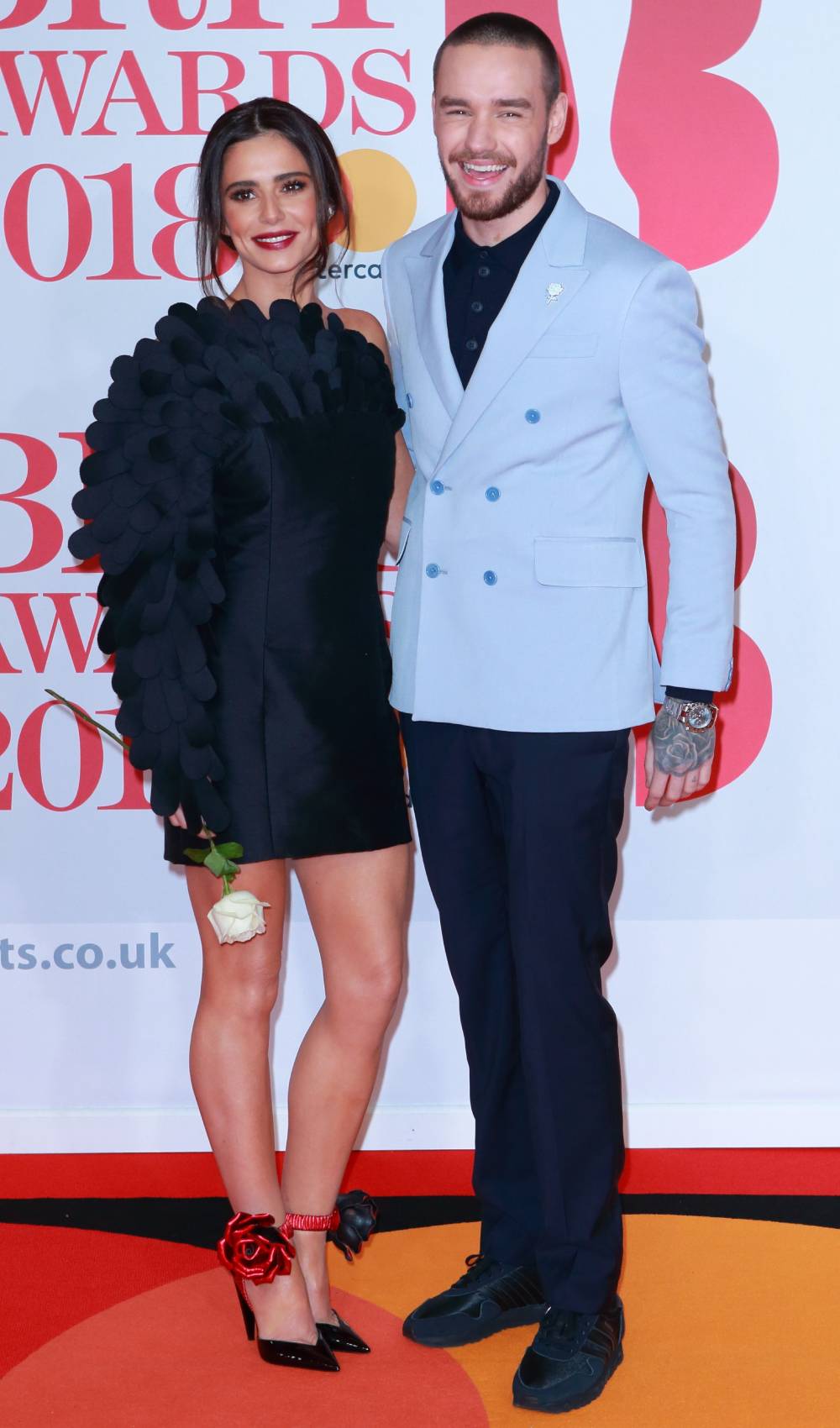 Cheryl and Liam Payne pose on the red carpet together in 2018