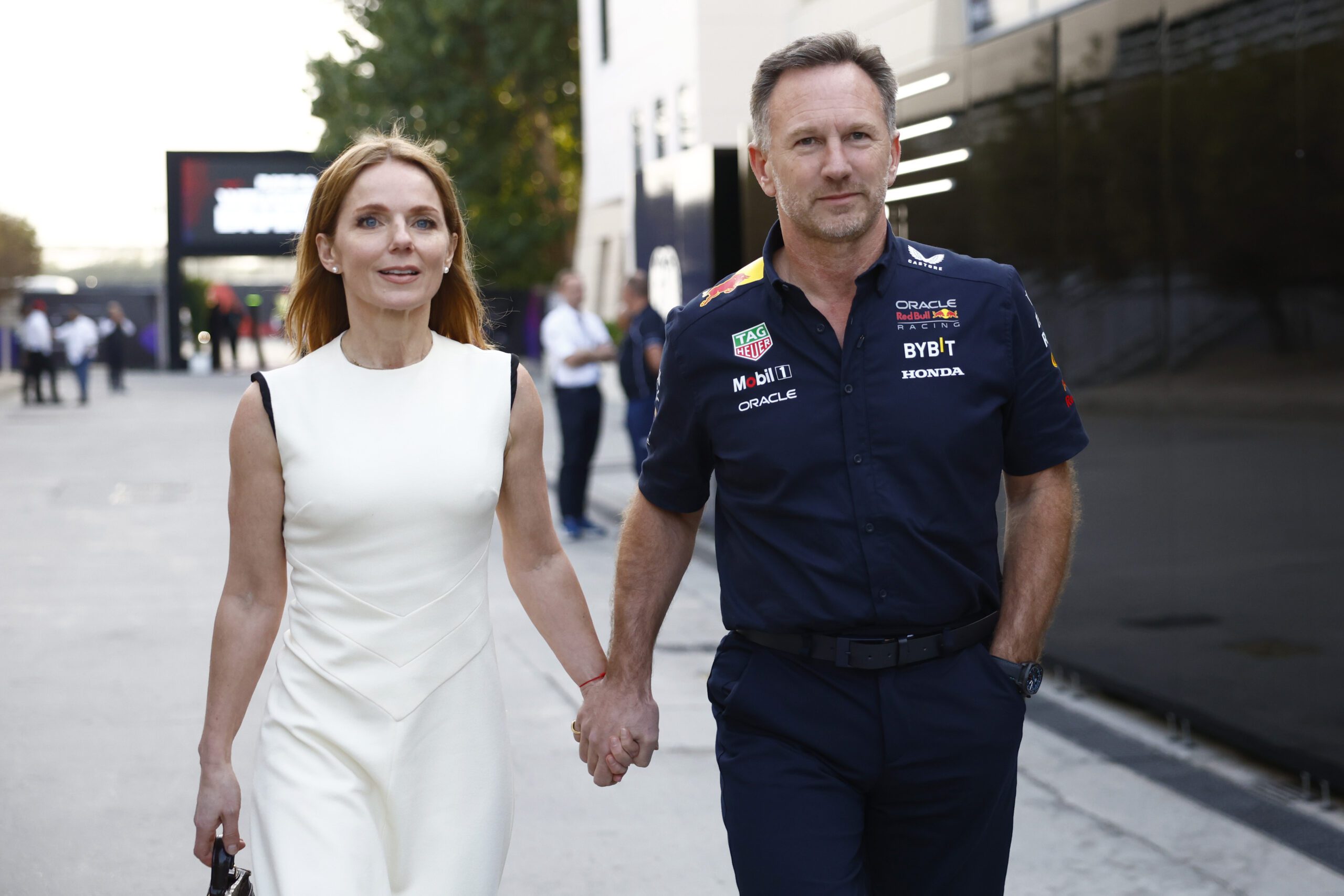 Geri Halliwell holding hands with husband Christian Horner at the Grand Prix