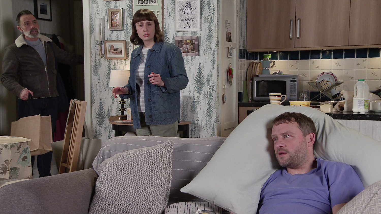 Coronation Street's Billy and Paul's PA are staring at Paul who is on the sofa