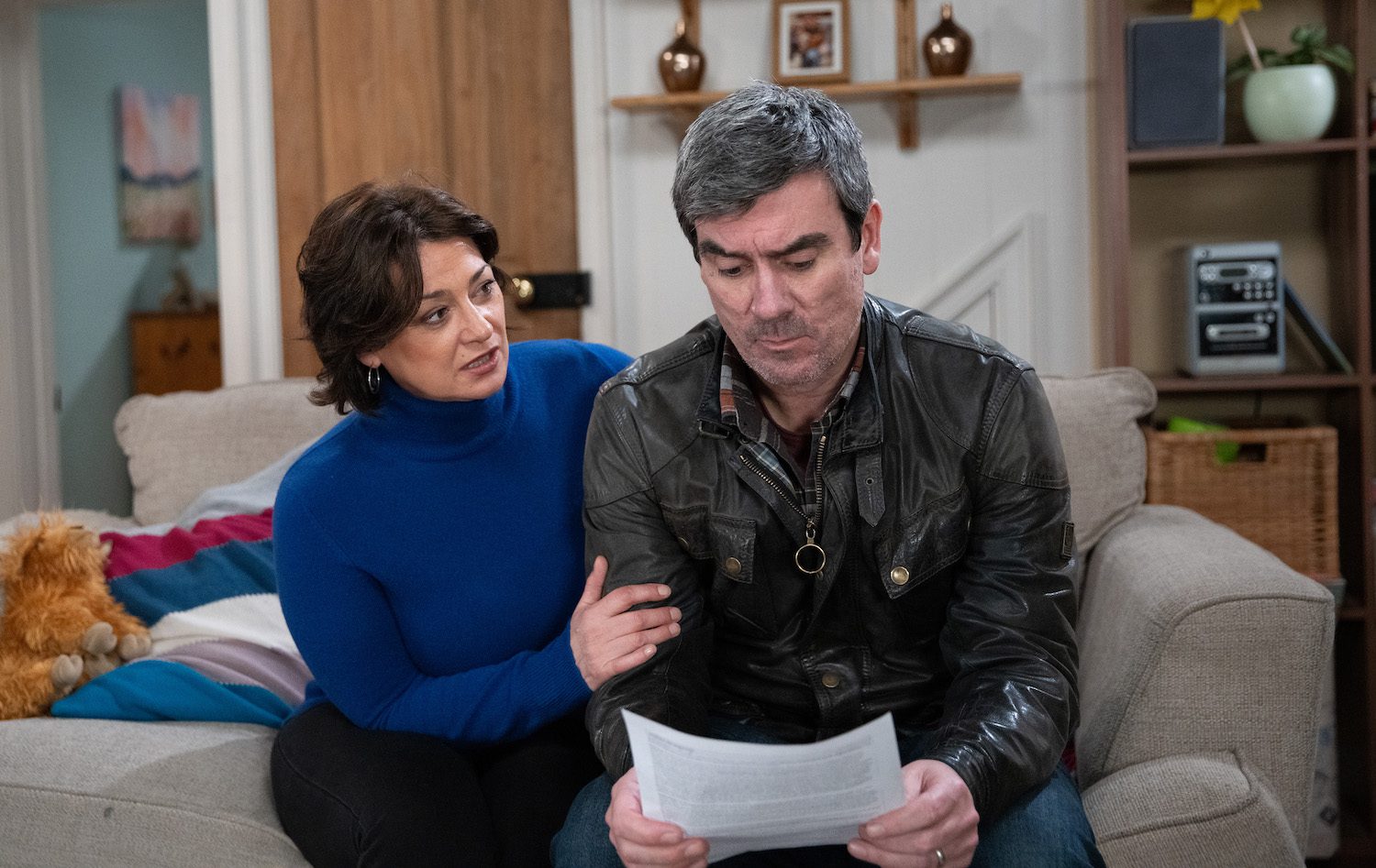 Emmerdale spoilers: worries Moira puts her hand on Cain's shoulder as he stares at a letter