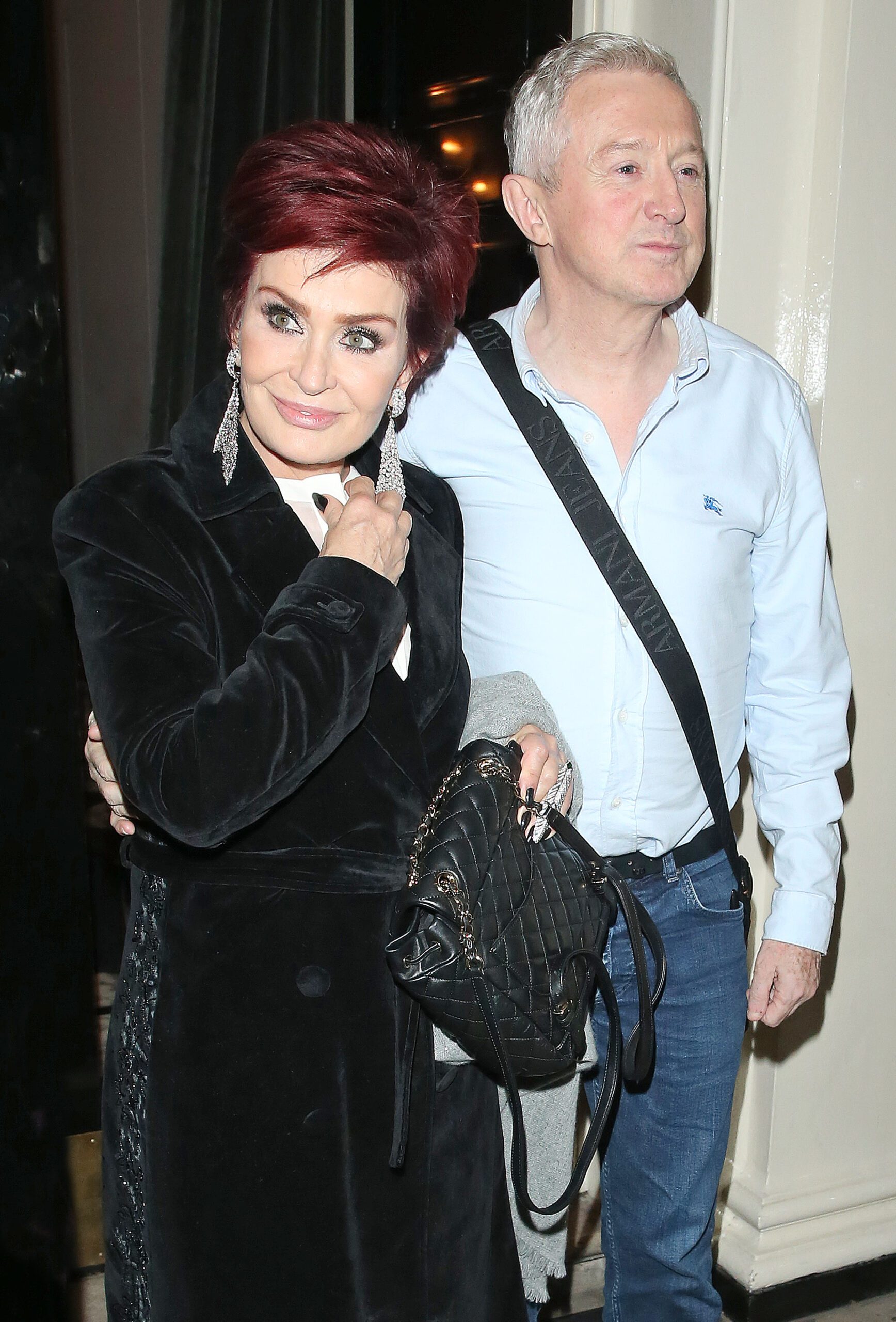 Sharon Osbourne and Louis Walsh leaving a building 