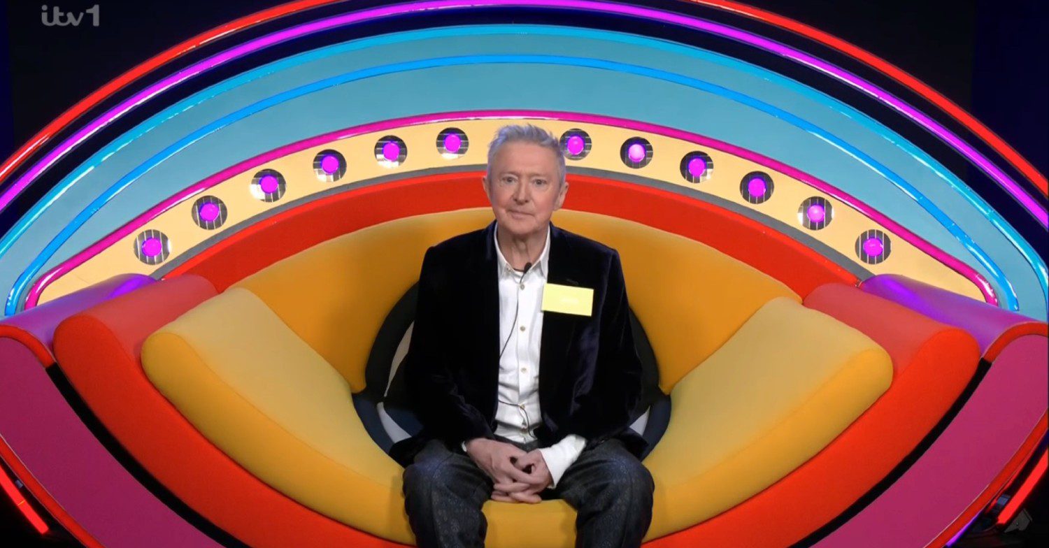 Louis Walsh sitting in the diary room on Celebrity Big Brother