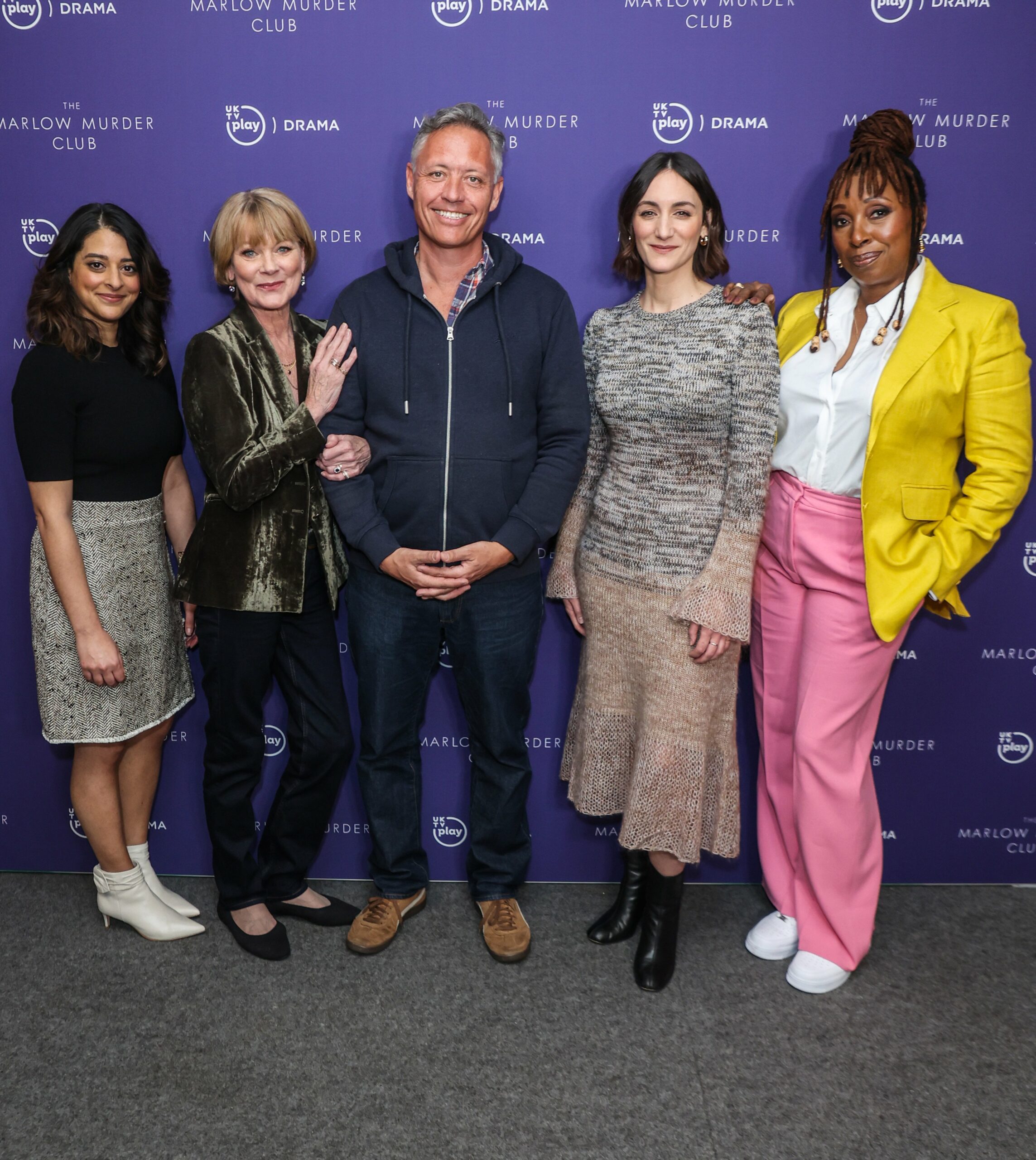 The Marlow Murder Club writer Robert Thorogood with cast of show