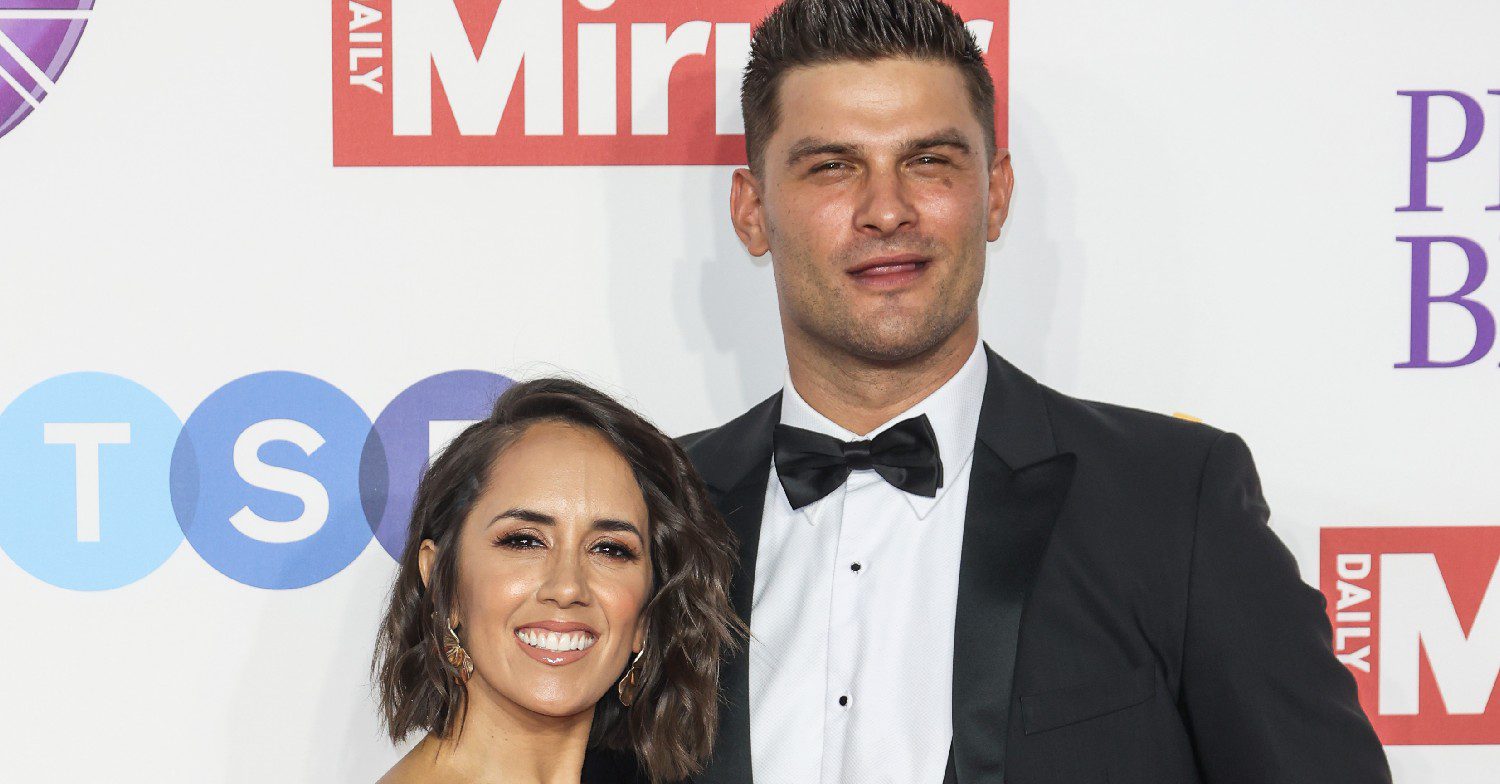 Janette Manrara and Aljaz Skorjanec posing