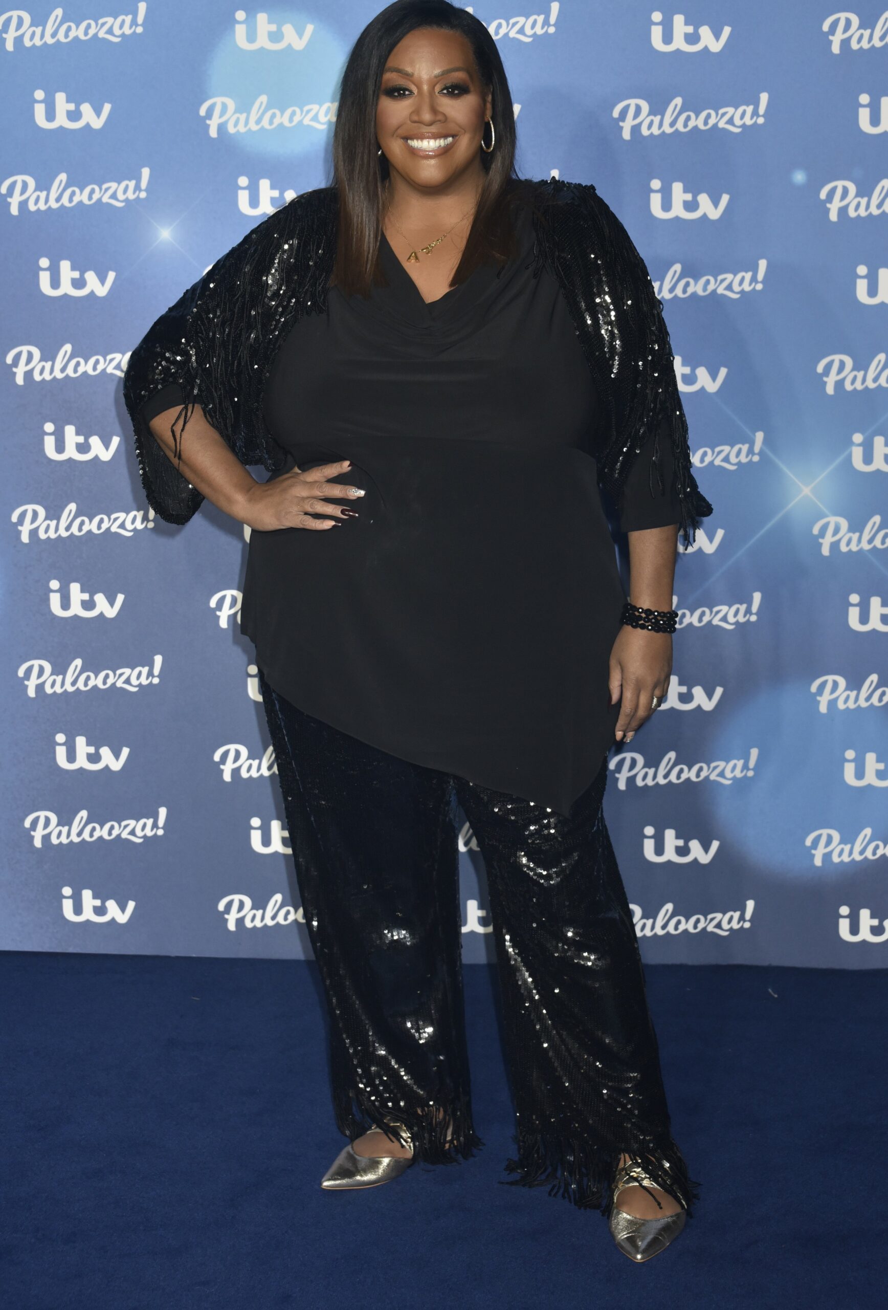 Alison Hammond smiling and posing at the ITV Palooza