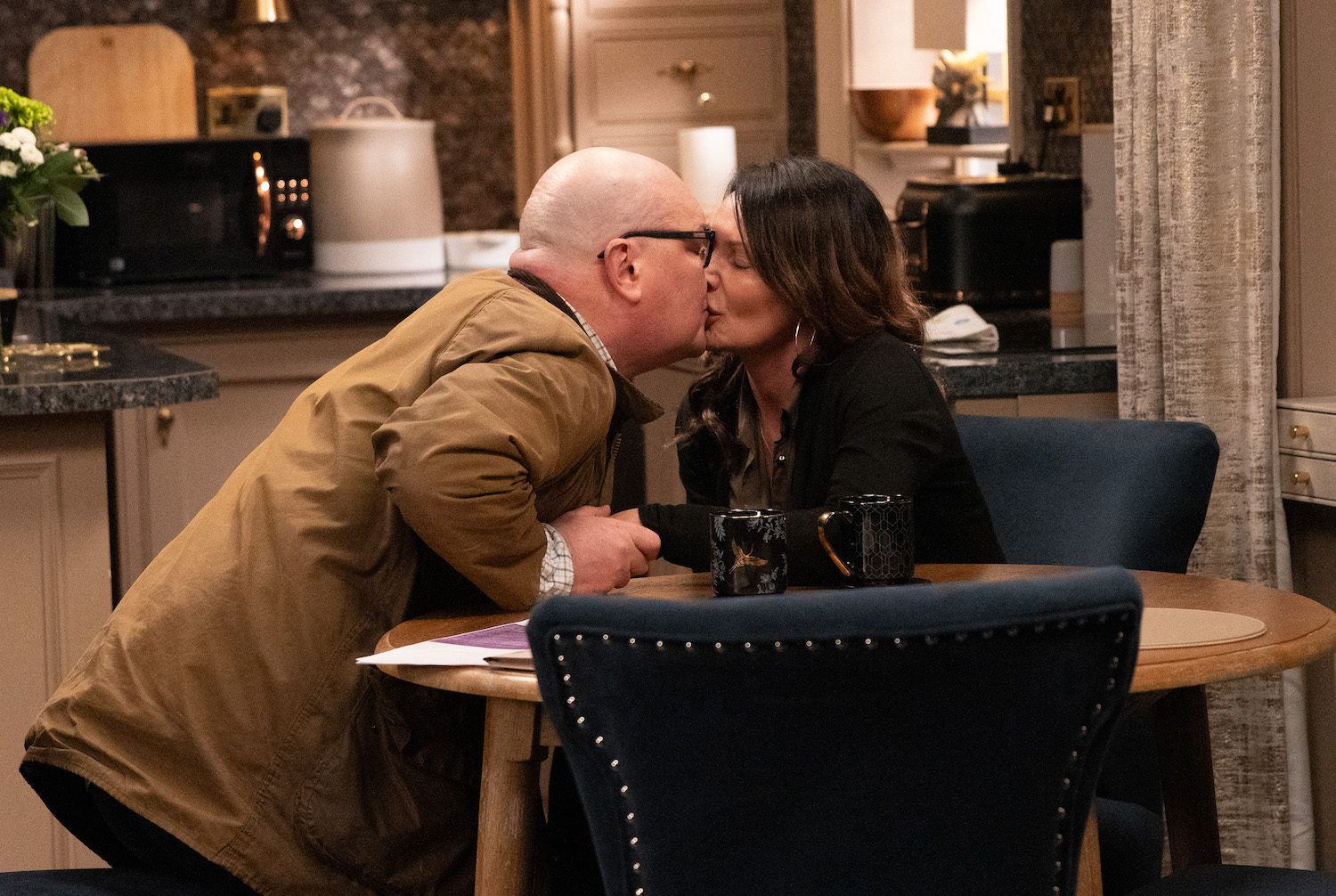 Paddy Kirk and Chas Dingle kiss