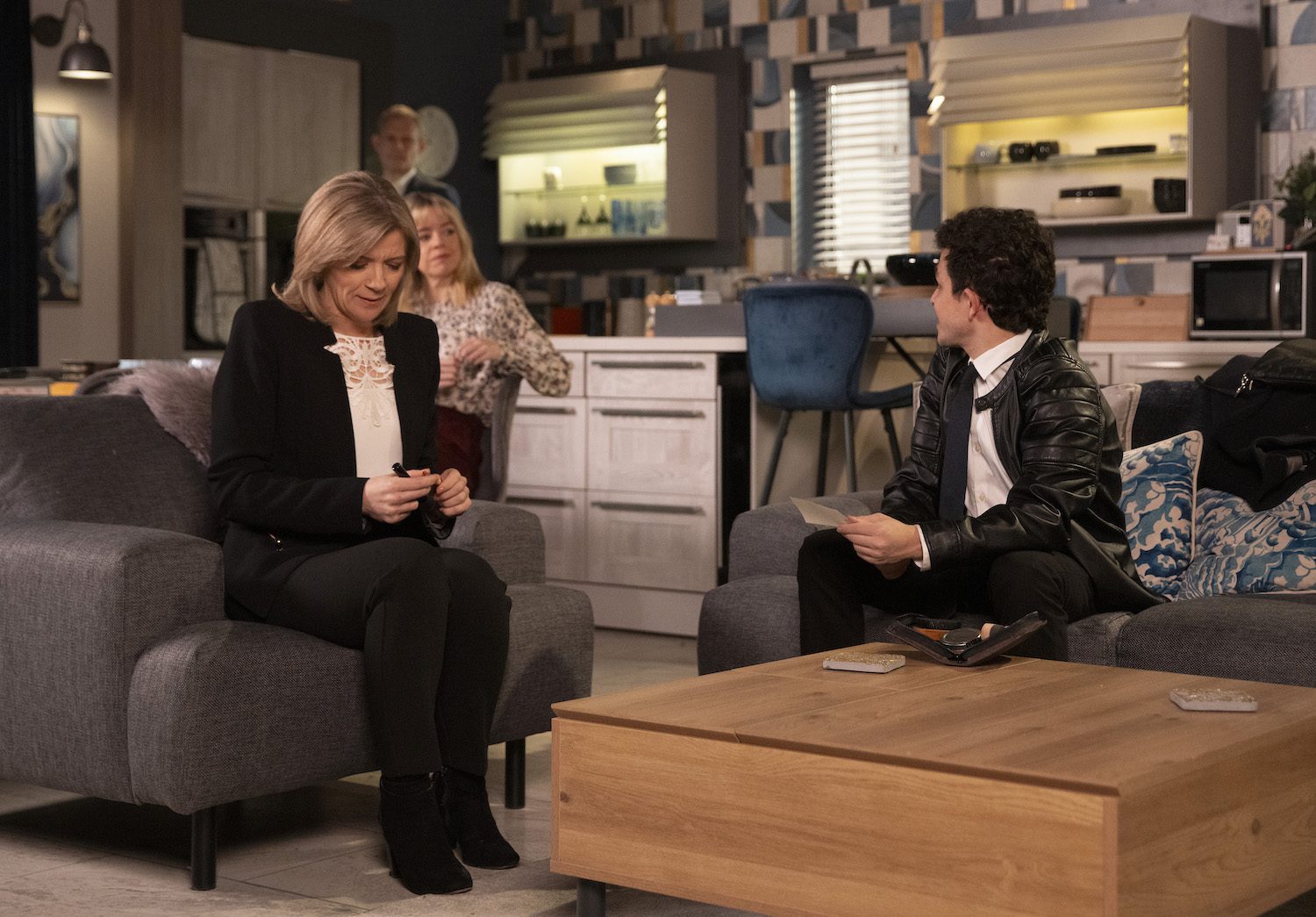 Coronation Street's Simon is talking to Leanne, Toyah and Nick in the flat