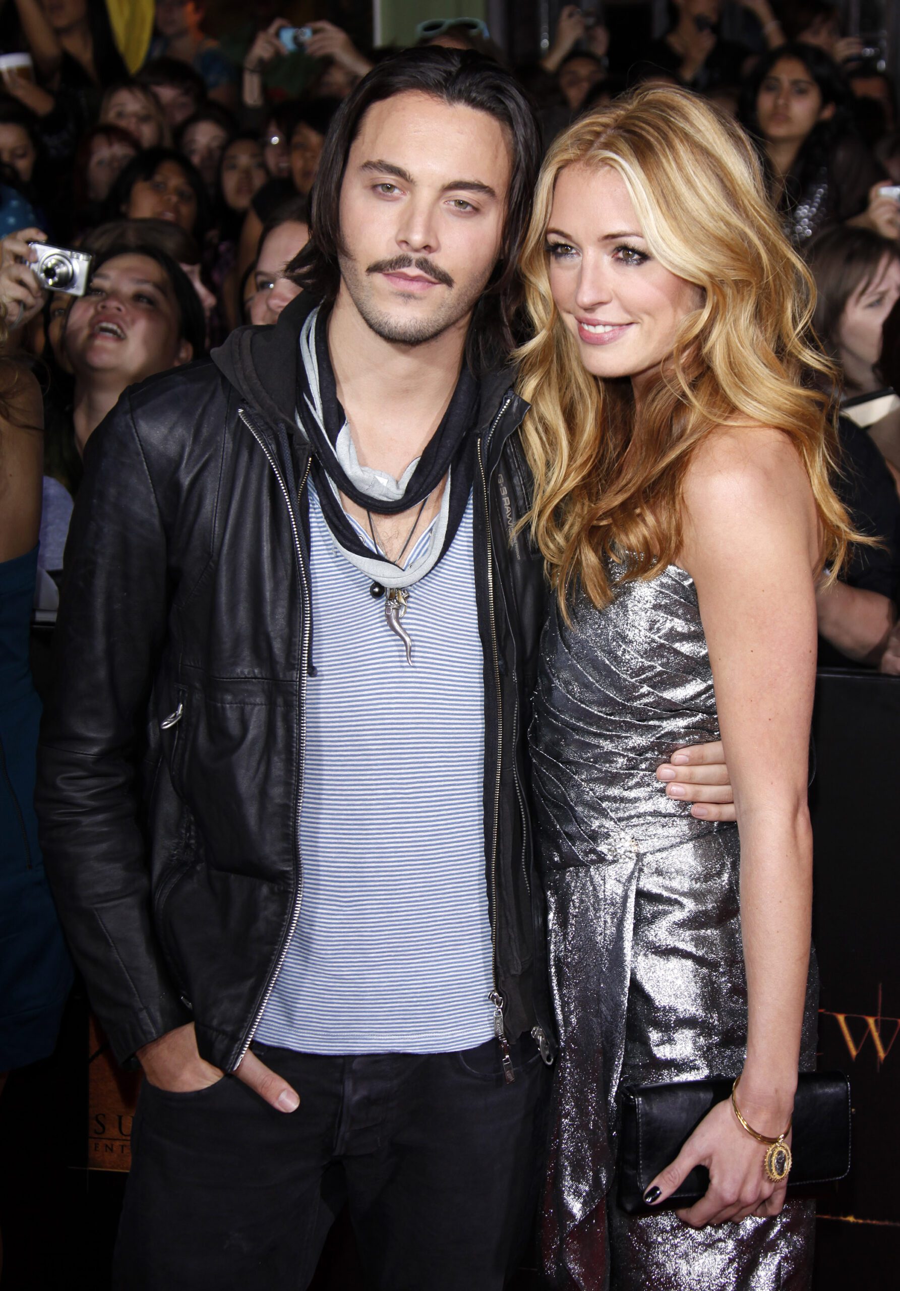 Cat Deeley cuddling up to Jack Huston on the red carpet