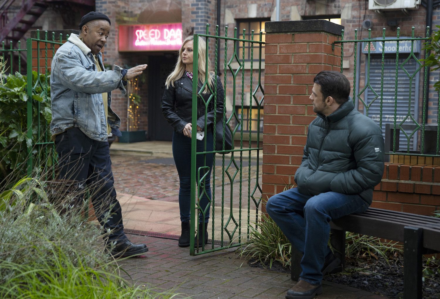 Coronation Street's Sarah, Ed and Damon are talking outside