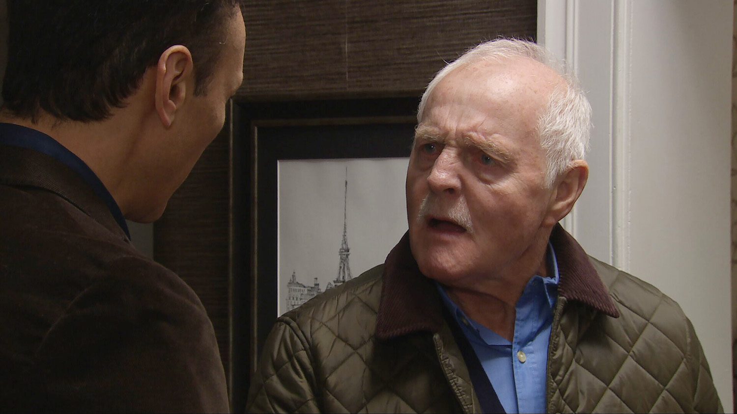 Pollard in Emmerdale looks angry at Jai