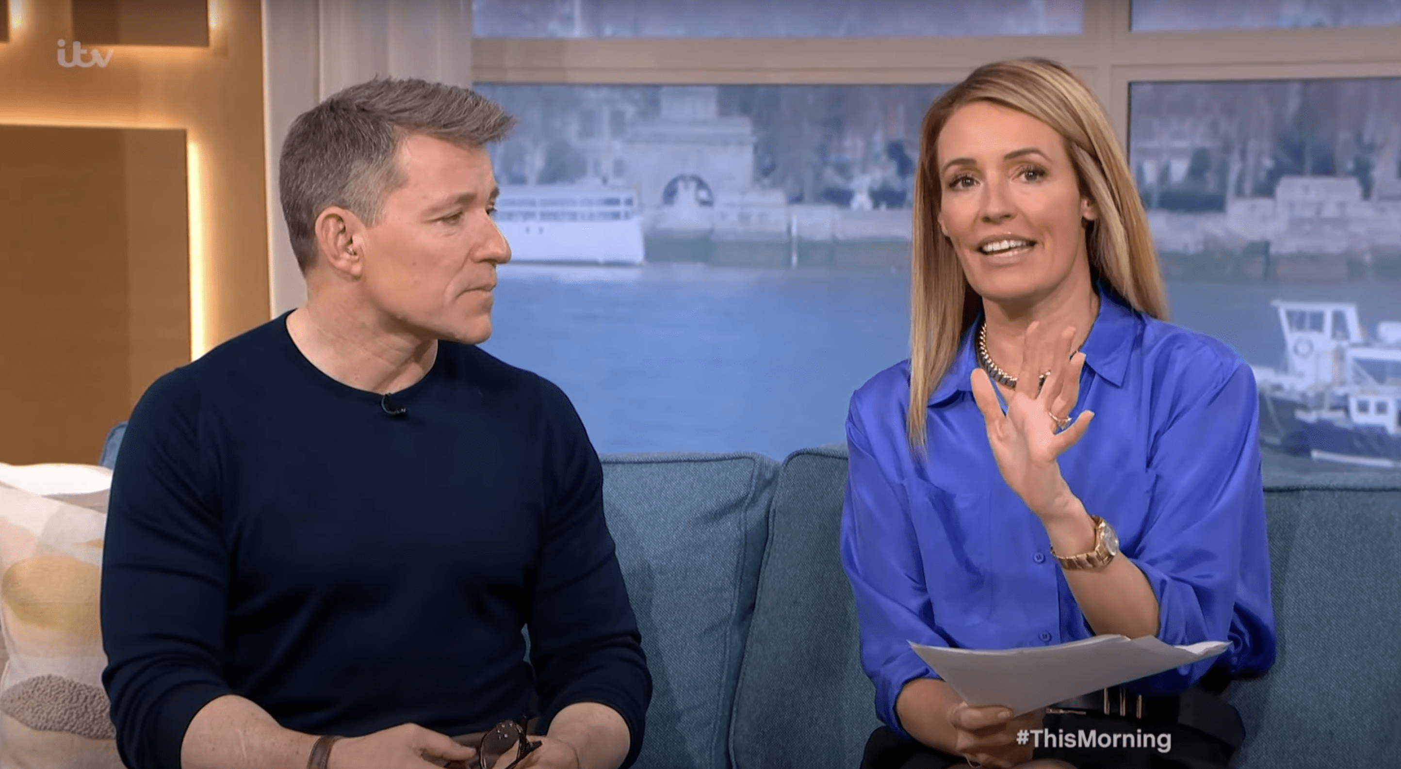 Cat Deeley wearing a blue shirt whilst presenting alongside Ben Shephard on This Morning
