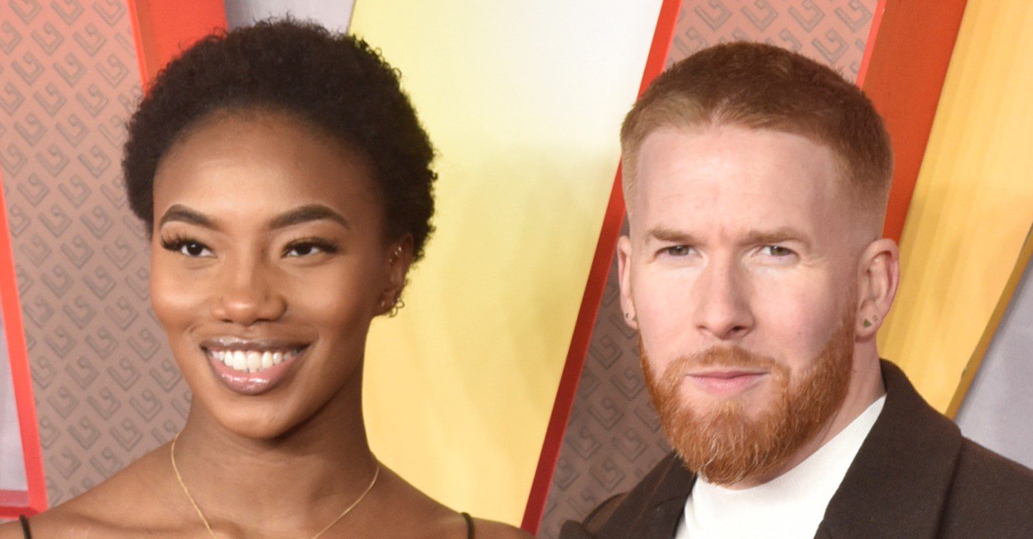 Chyna Mills and Neil Jones posing on a red carpet 