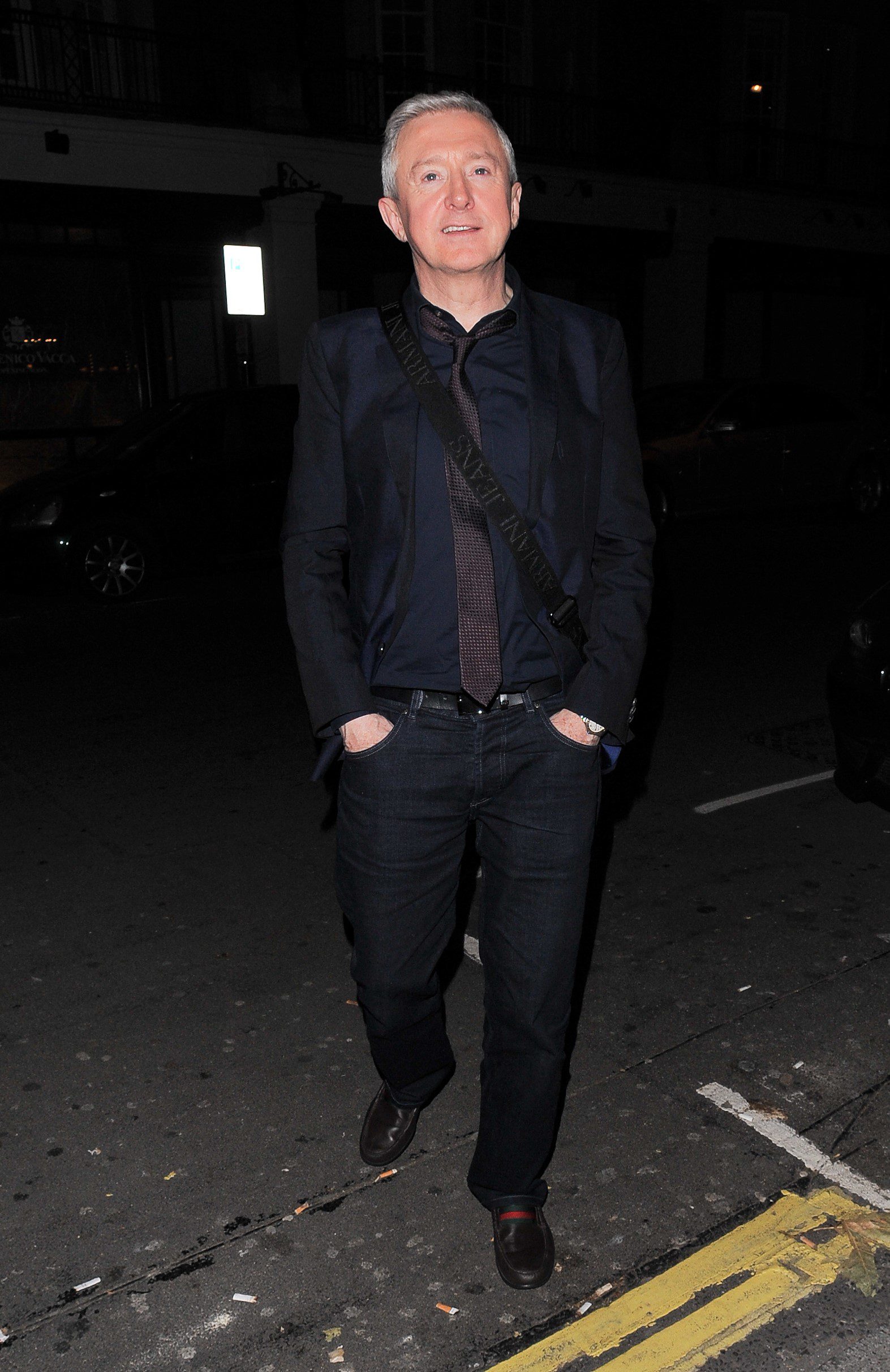 Louis Walsh walking on night out