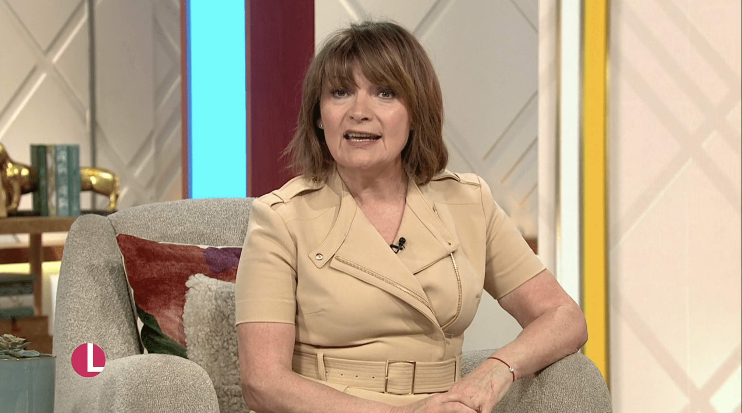 Lorraine Kelly wearing a beige dress on the Lorraine Kelly show ITV