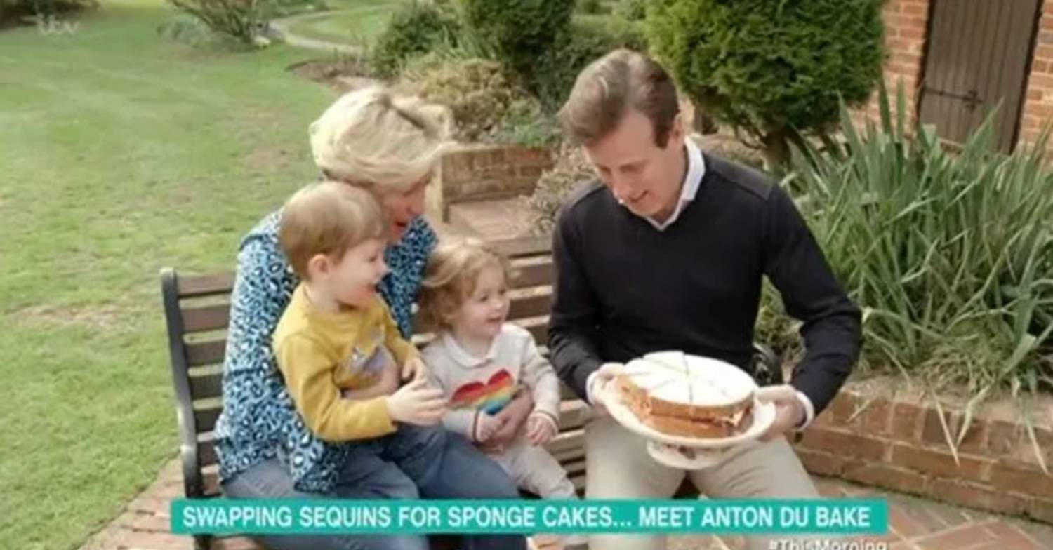 Anton Du Beke shows off a cake