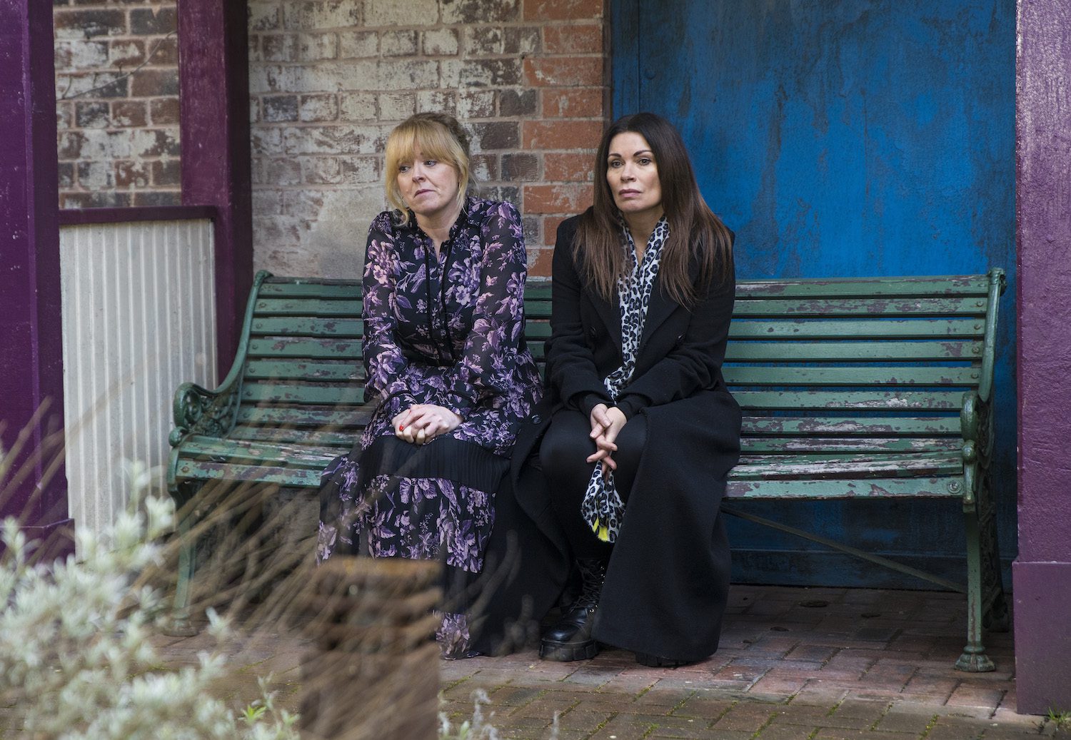 Carla and Jenny sit outside on Corrie