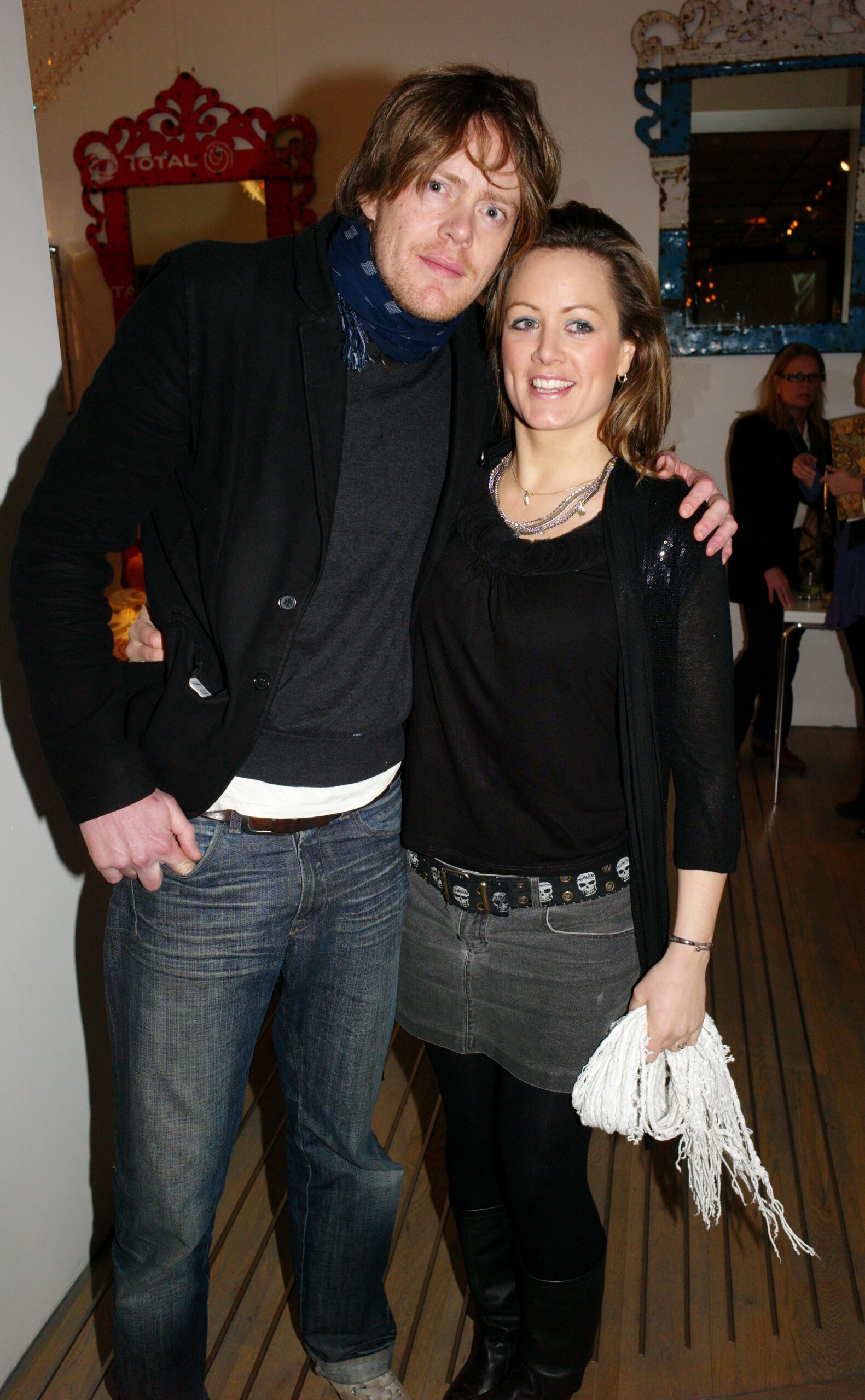 Kris Marshall with arm around his wife Hannah Dodkin