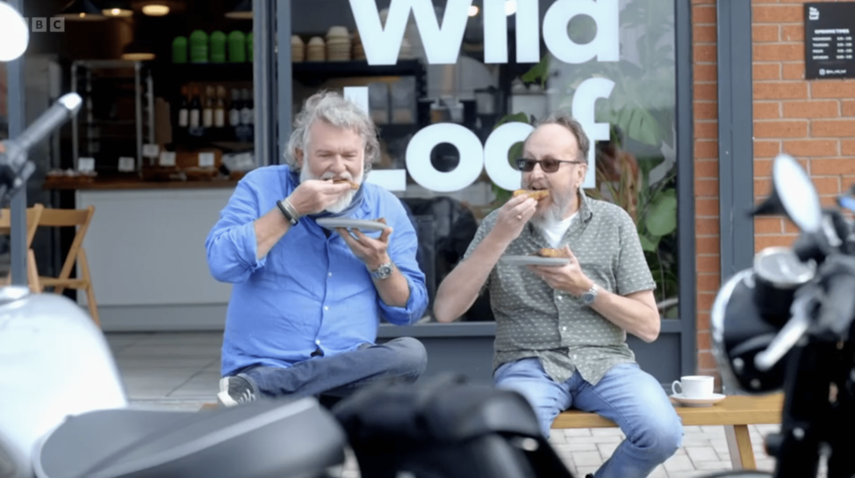 Si King and Dave Myers sat down eating during the last episode of The Hairy Bikers go West