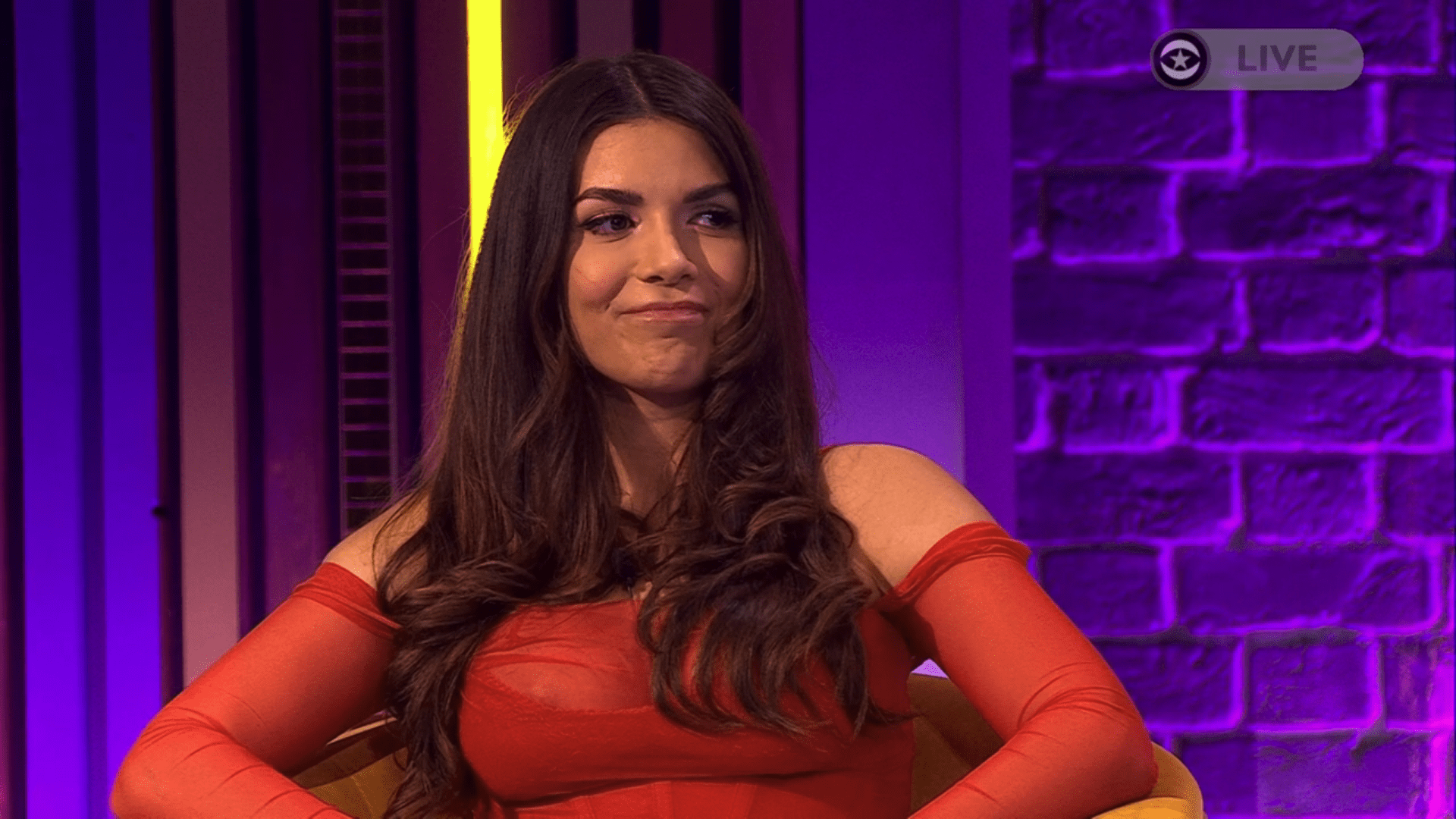 Ekin-Su on Celebrity Big Brother wearing a red dress