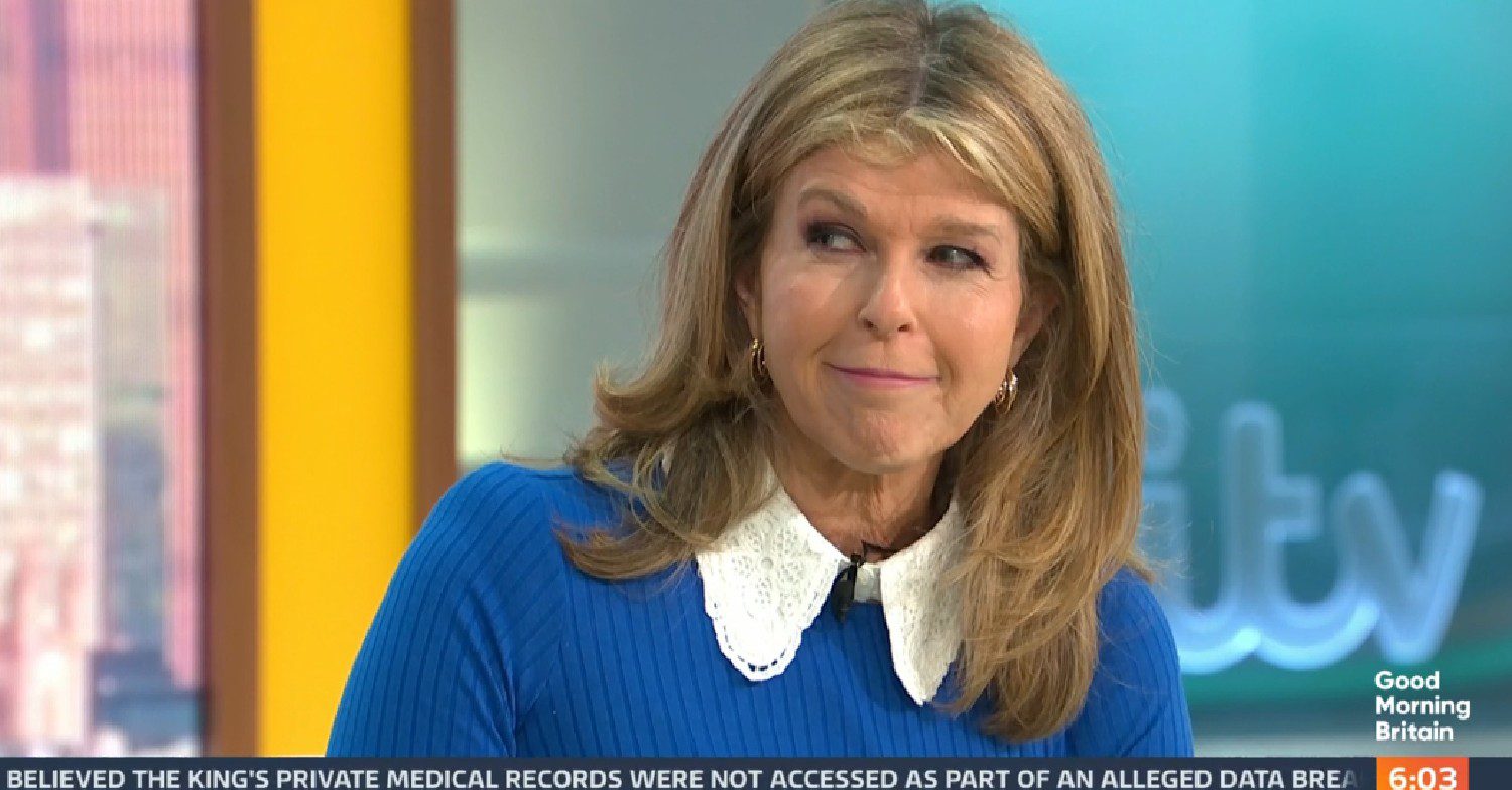 Kate Garraway smiling in blue jumper on GMB today