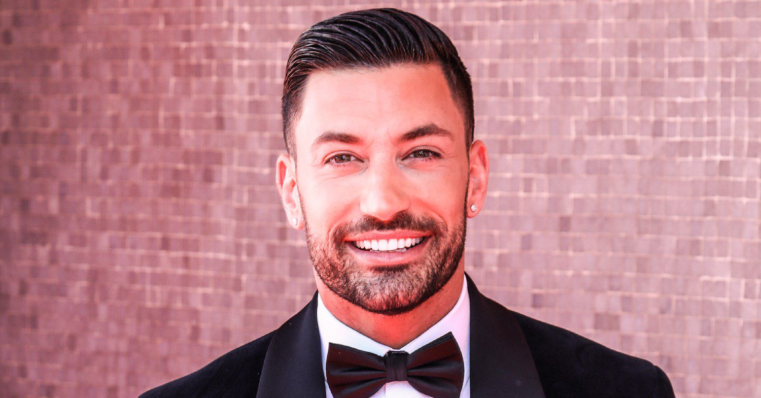 Giovanni Pernice smiling at the BAFTAs