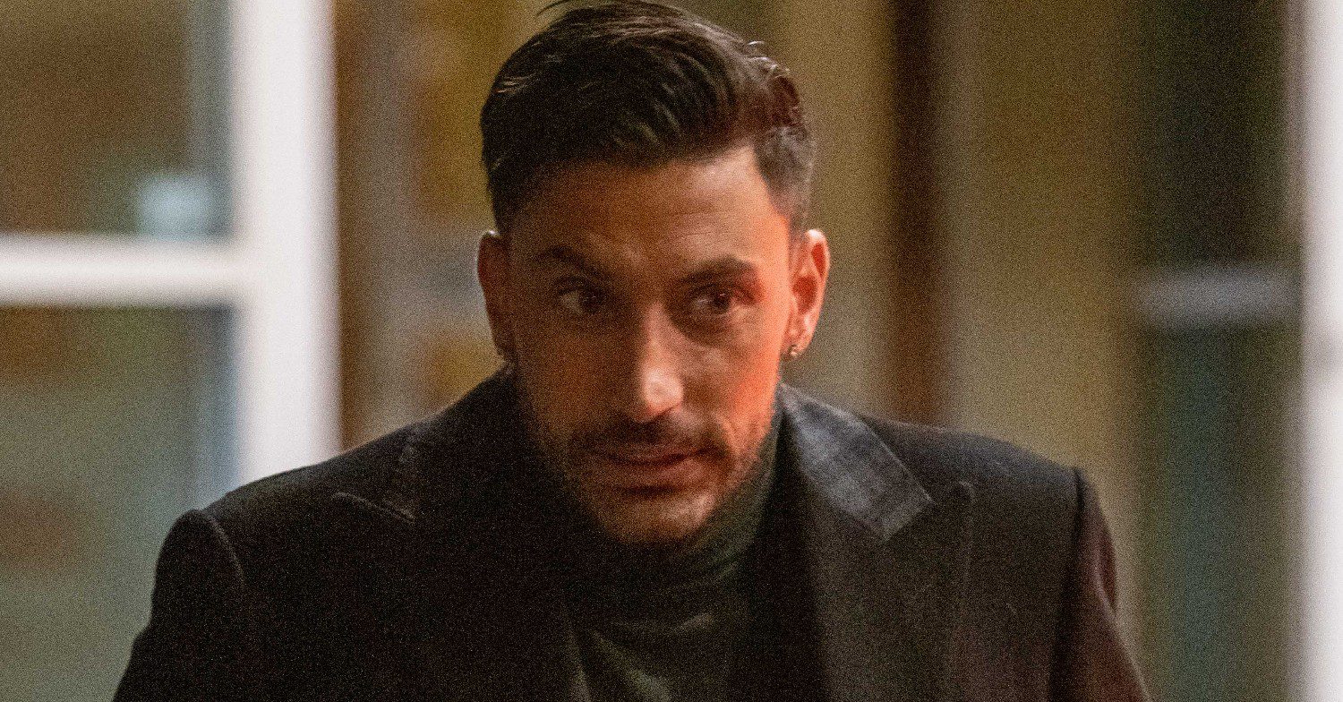 Giovanni Pernice looks serious on night out