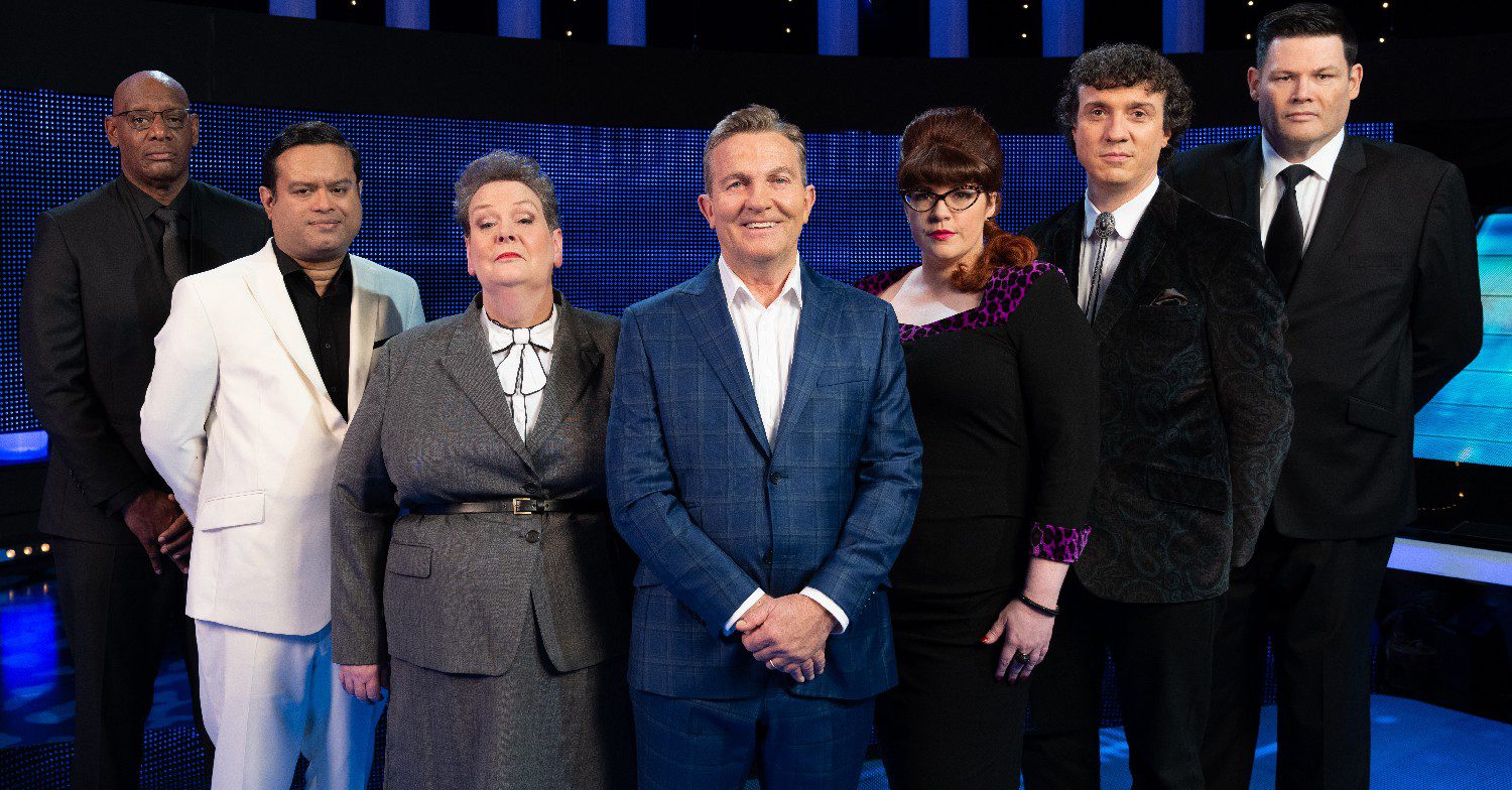 Bradley Walsh smiles alongside The Chase stars