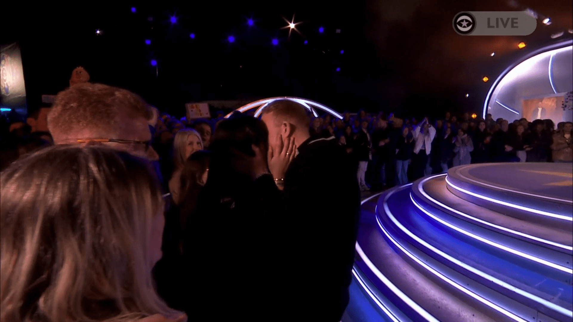 Colson Smith kisses his girlfriend